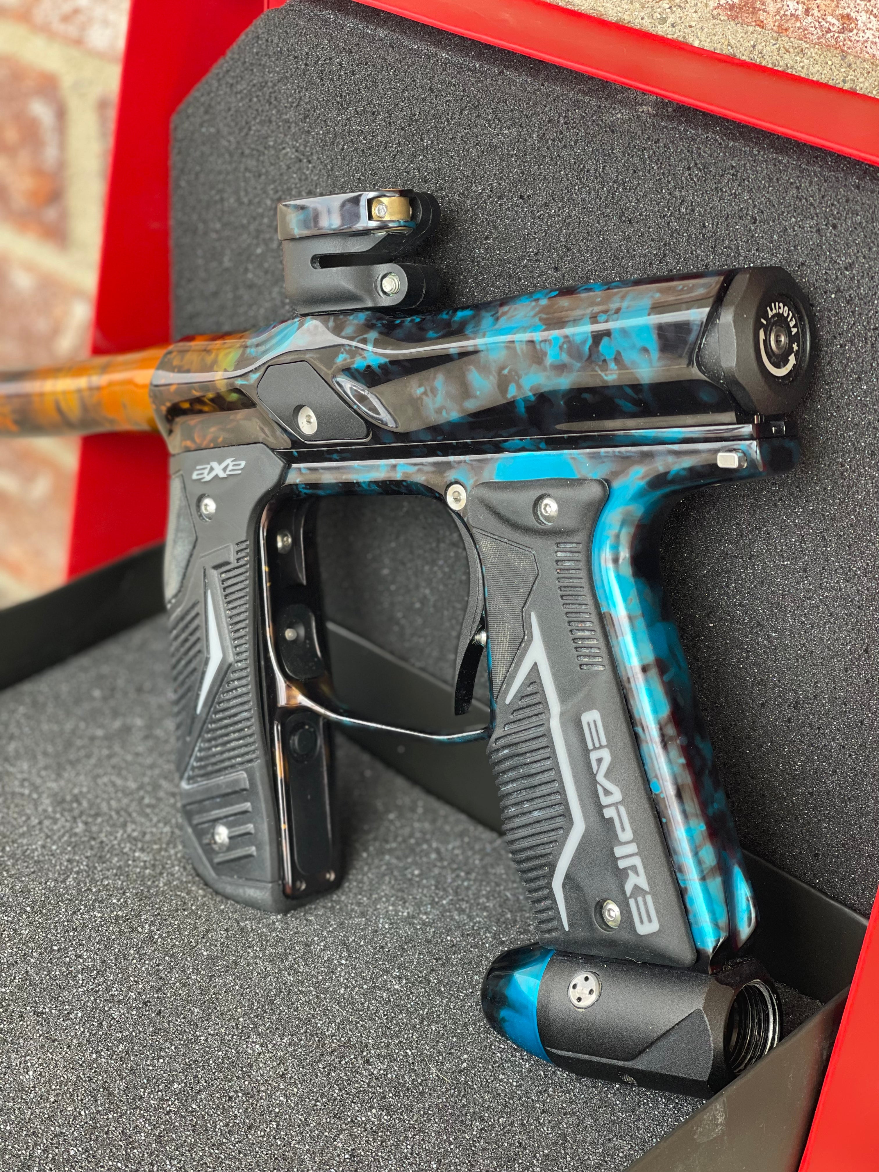 Used Empire Axe 2.0 Paintball Gun - Acid Wash Custom Anno (Orange Teal)