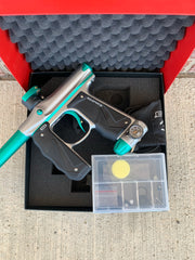 Used Empire Mini GS Paintball Gun- Silver/Aquamarine