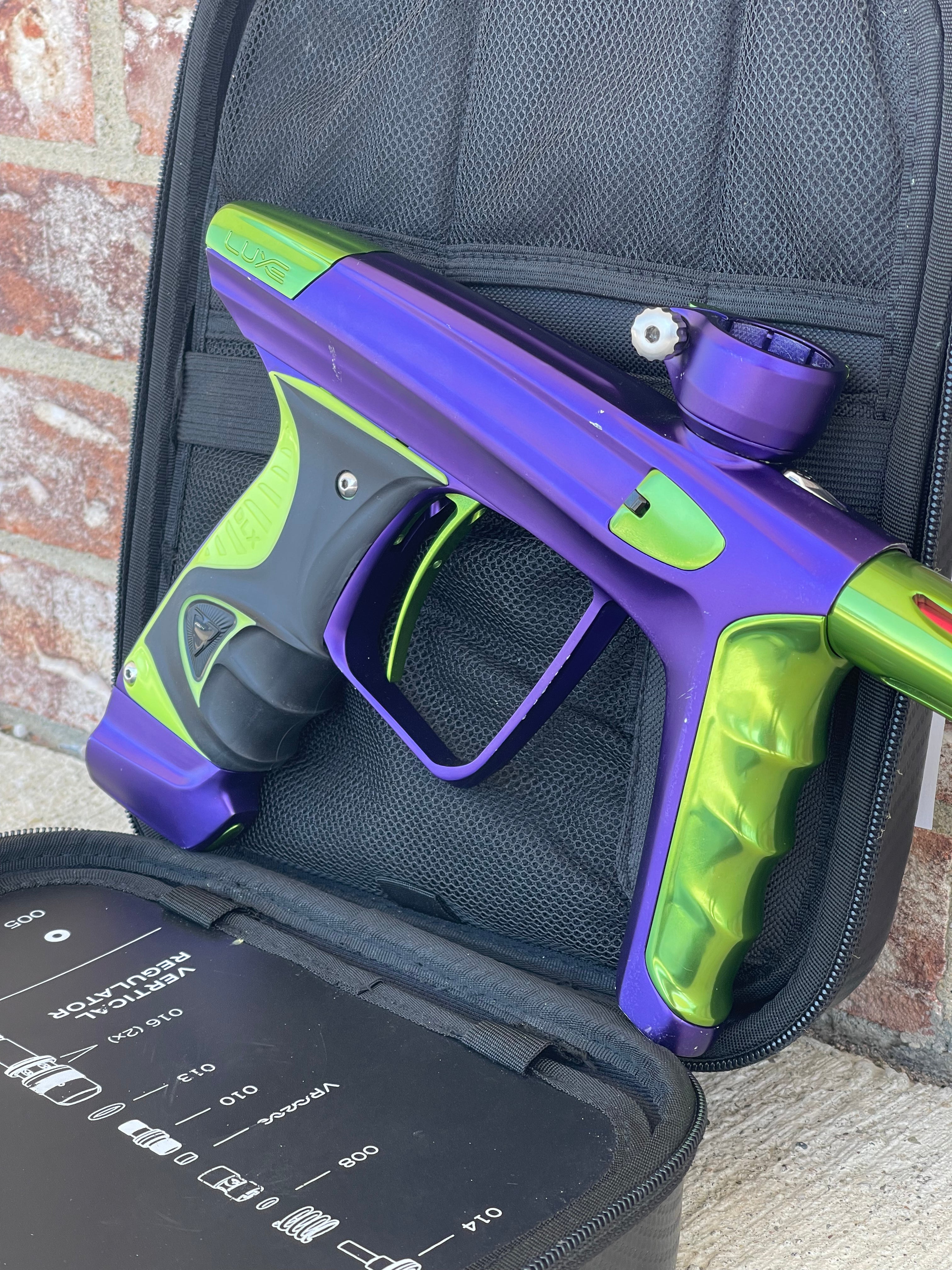 Used DLX Luxe X Paintball Gun - Dust Purple / Polished Green