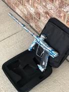 Used SP Shocker RSX Paintball Gun - Silver/Blue Splash