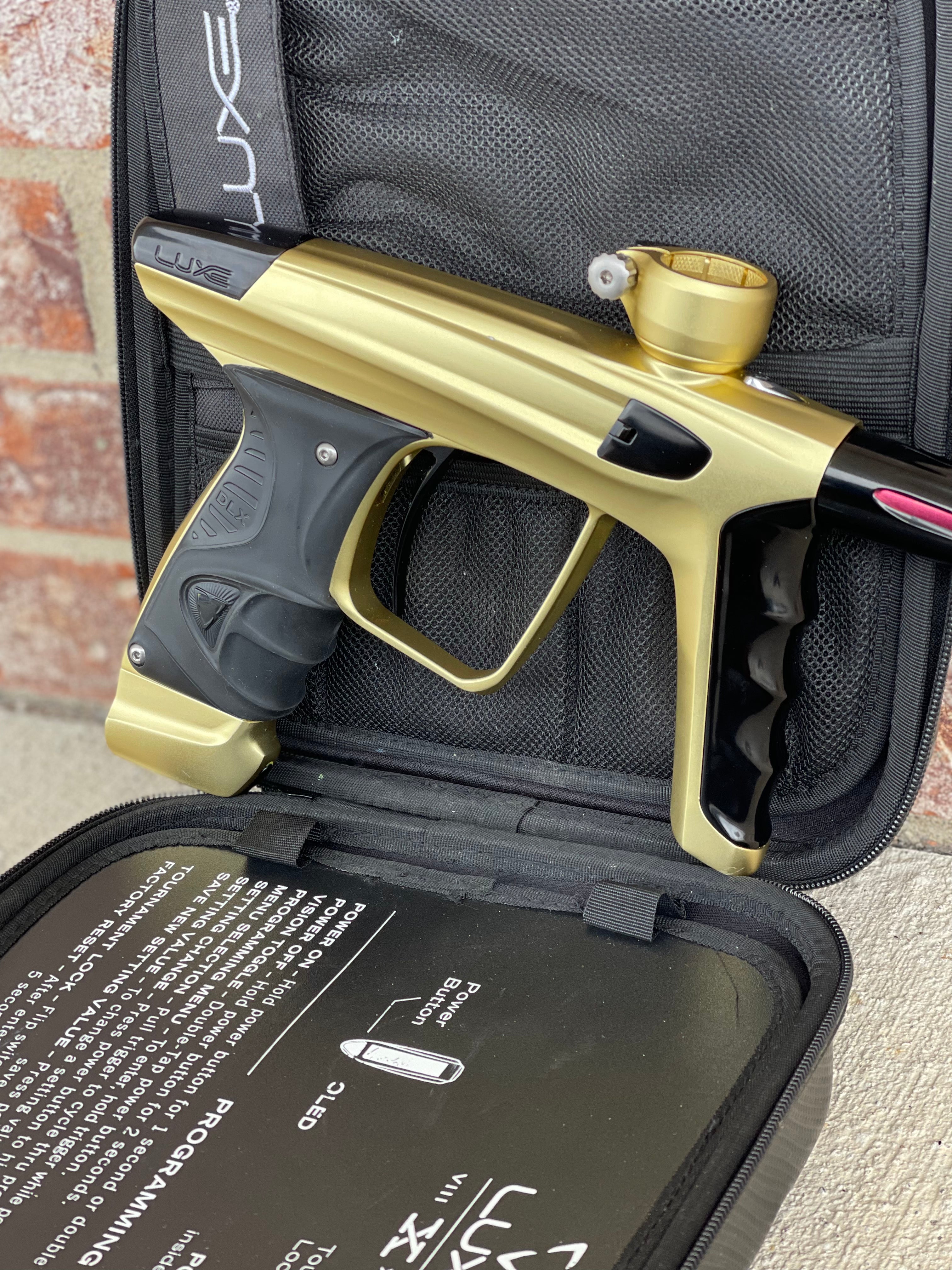 Used DLX Luxe X Paintball Gun - Dust Gold / Polished Black