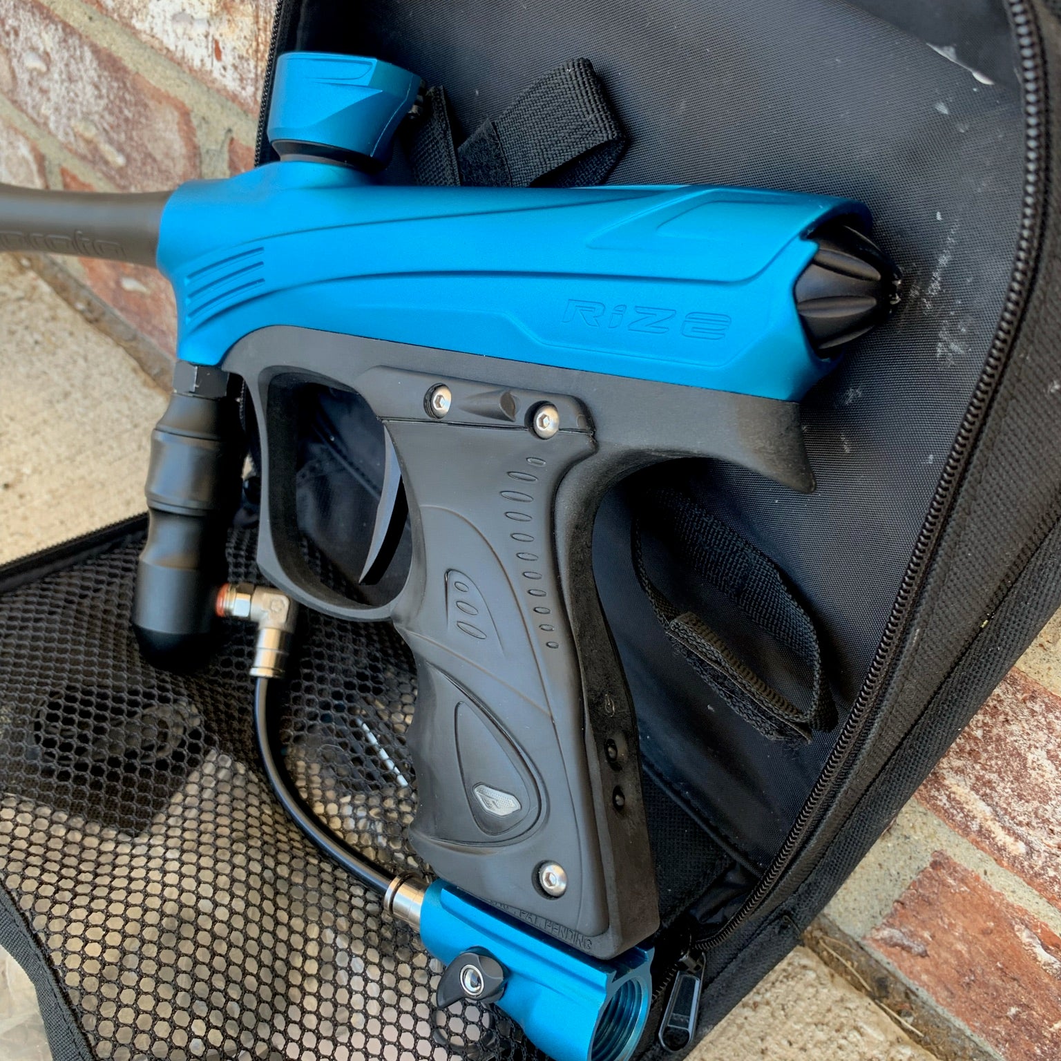 Used Dye Rize Maxxed Paintball Gun - Blue / Grey