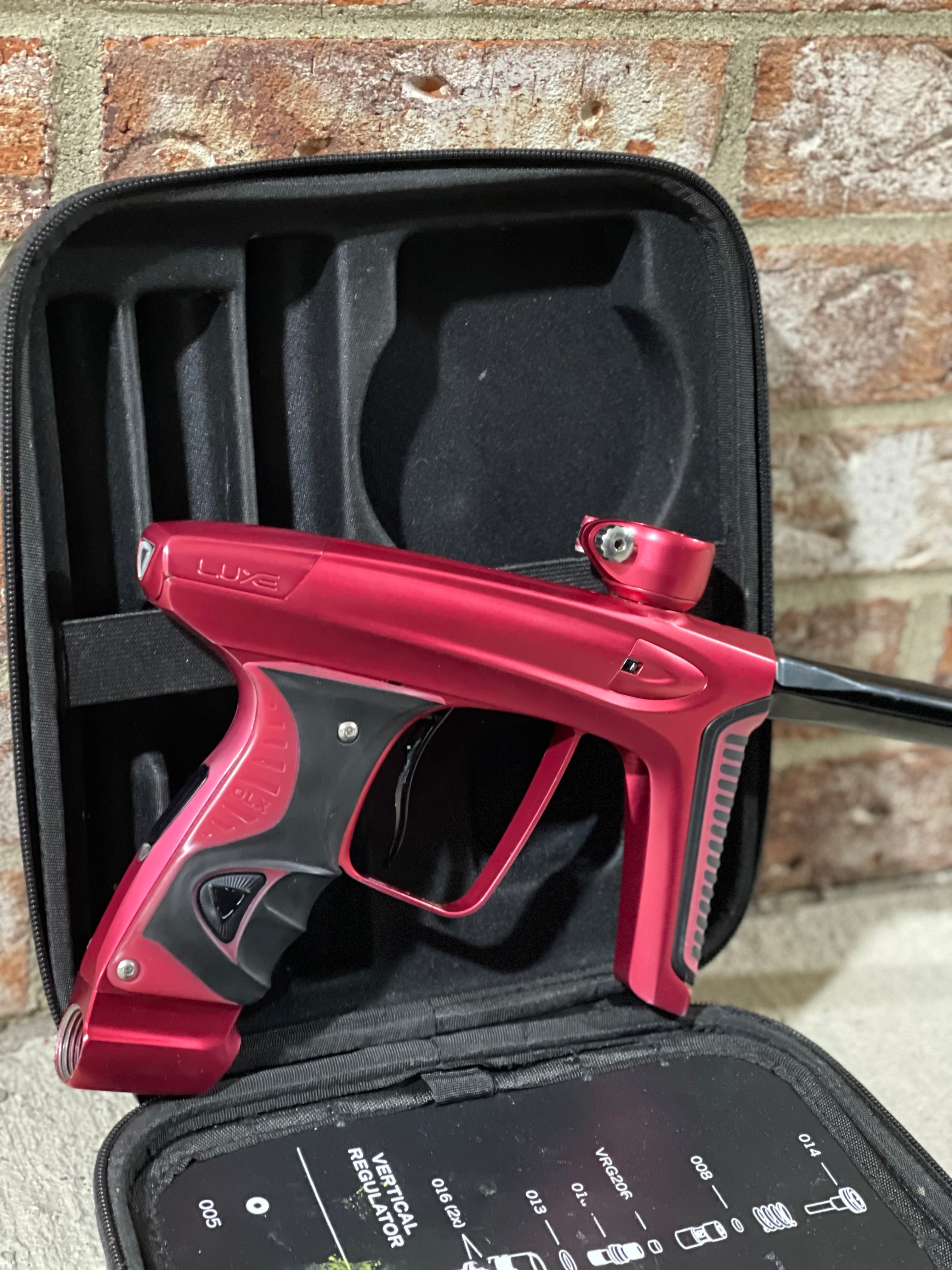 Used DLX Luxe Ice Paintball Gun - Dust Red / Dust Red w/ Inception Barrel, Encore Bolt/Stock Bolt, Scythe Trigger and Stock Trigger, Large Spare Part Kits