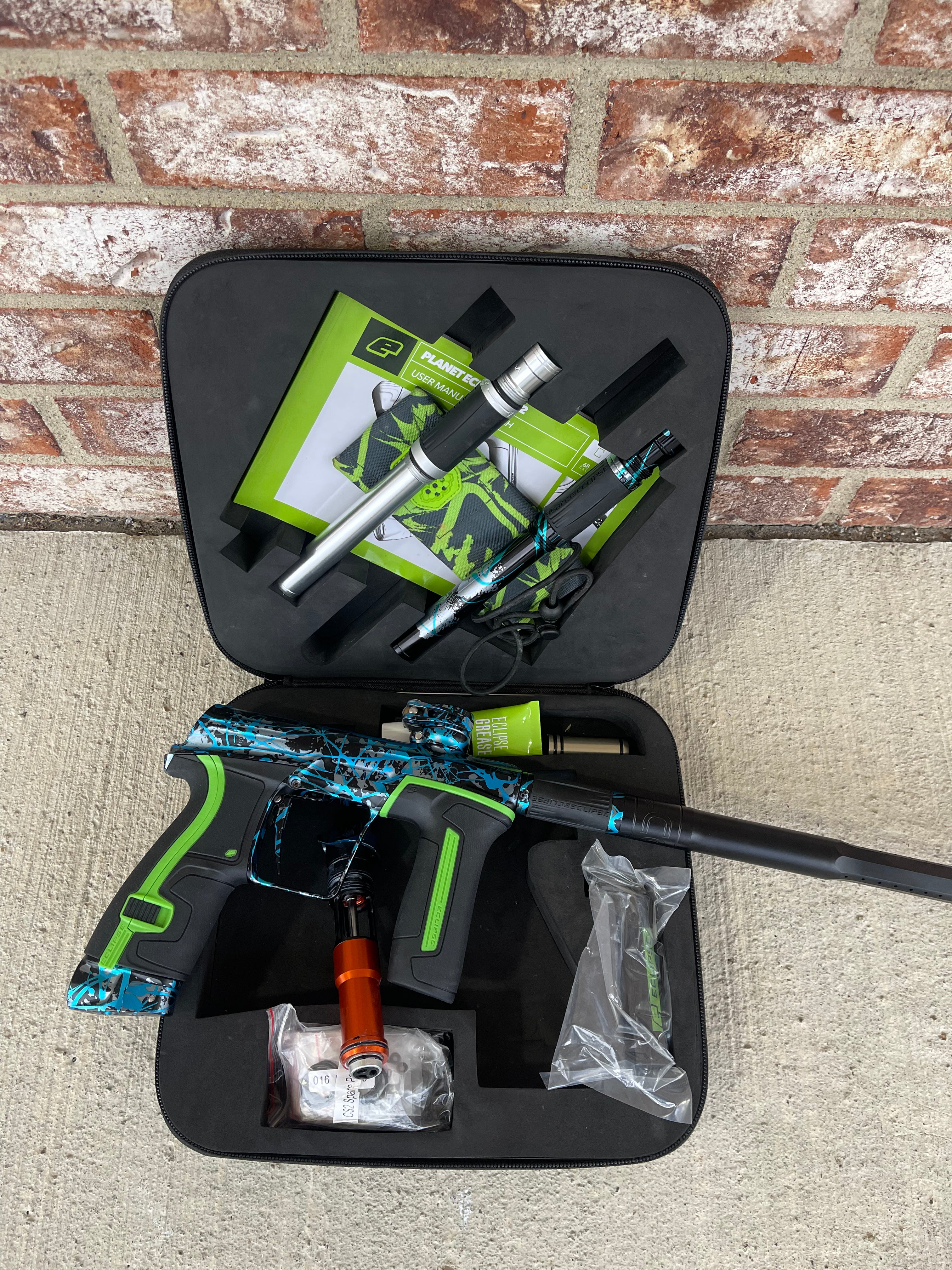 Used Planet Eclipse CS2 Paintball Gun - Aftershock Splash w/ Green Grip Kit