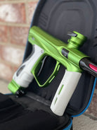 Used Shocker XLS Paintball Marker- Green w/ Extra Inserts and White Grips