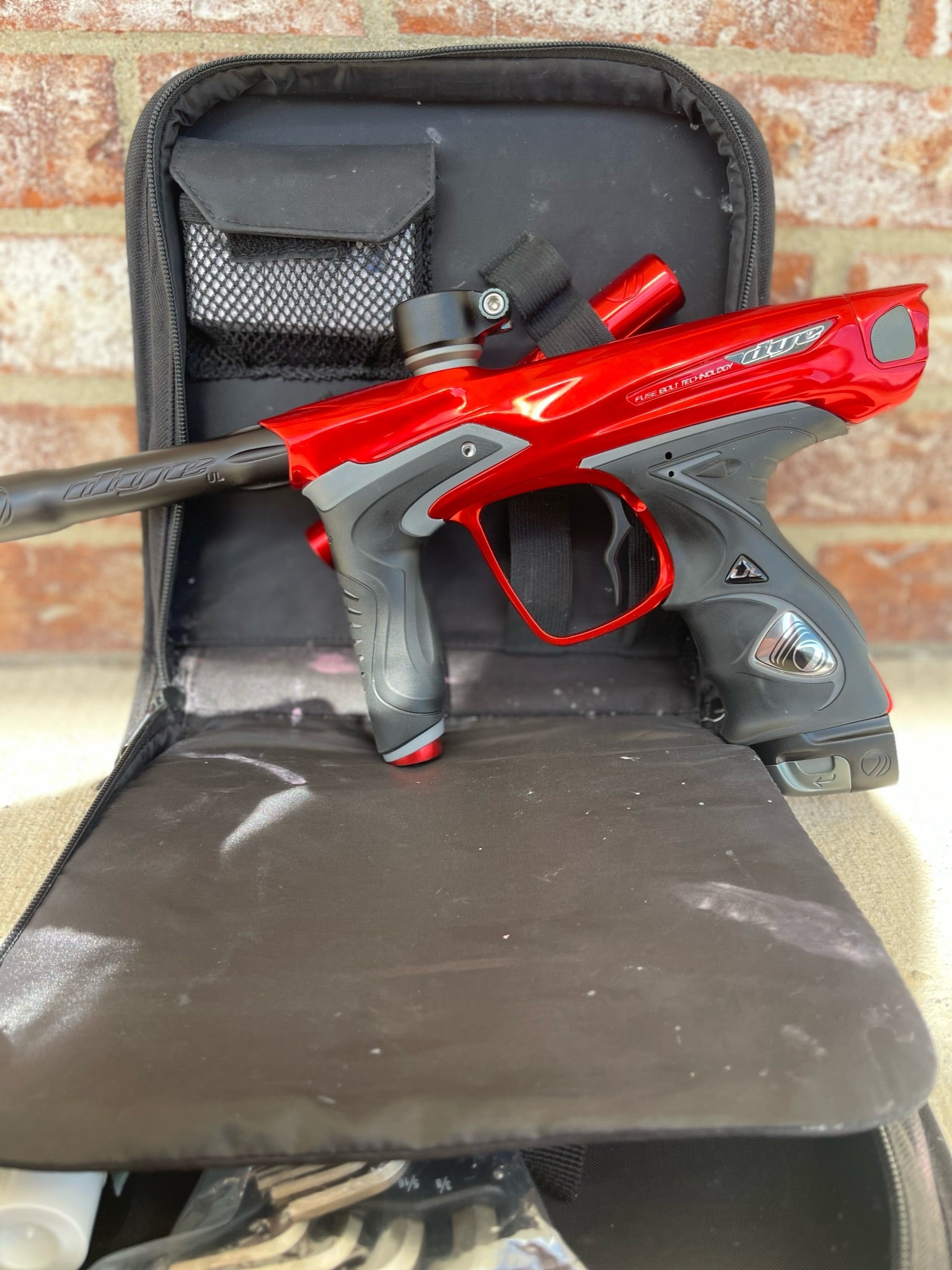 Used Dye DM15 Paintball Marker - Gloss Red w/ 2 UL Backs, Lockdown 2 Feedneck, SLAP ASA, Deuce Trigger