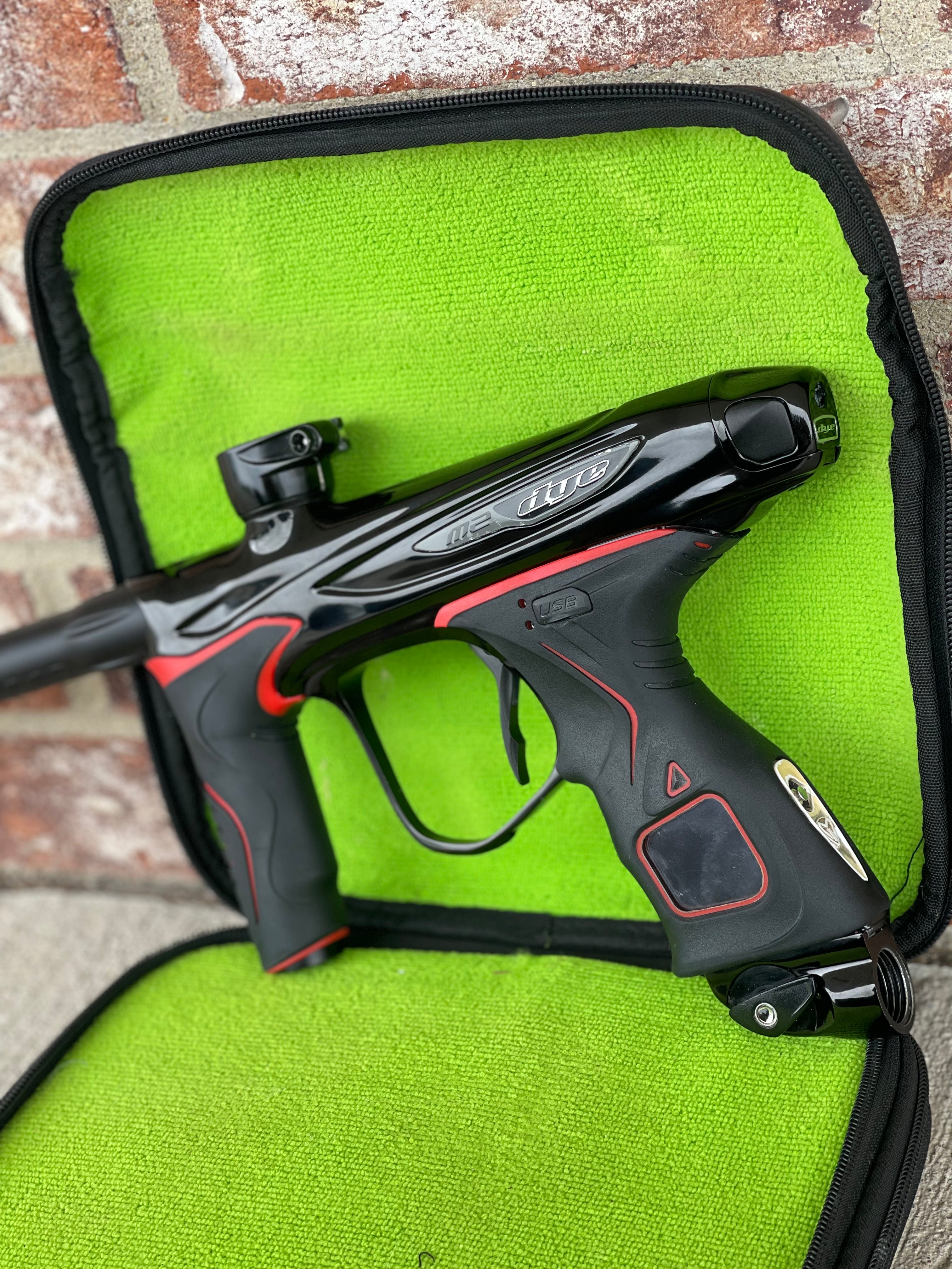 Used Dye M2 MOSAir Paintball Marker - Black w/Red Grip