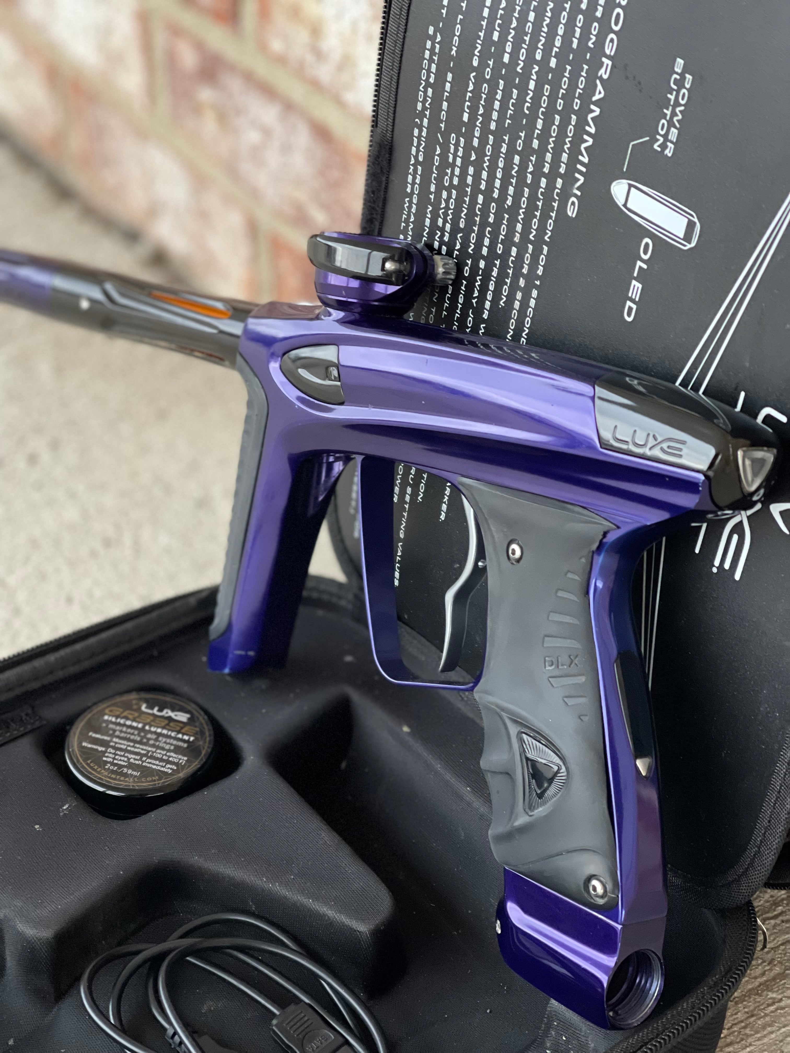 Used DLX Luxe Ice Paintball Gun - Purple / Black