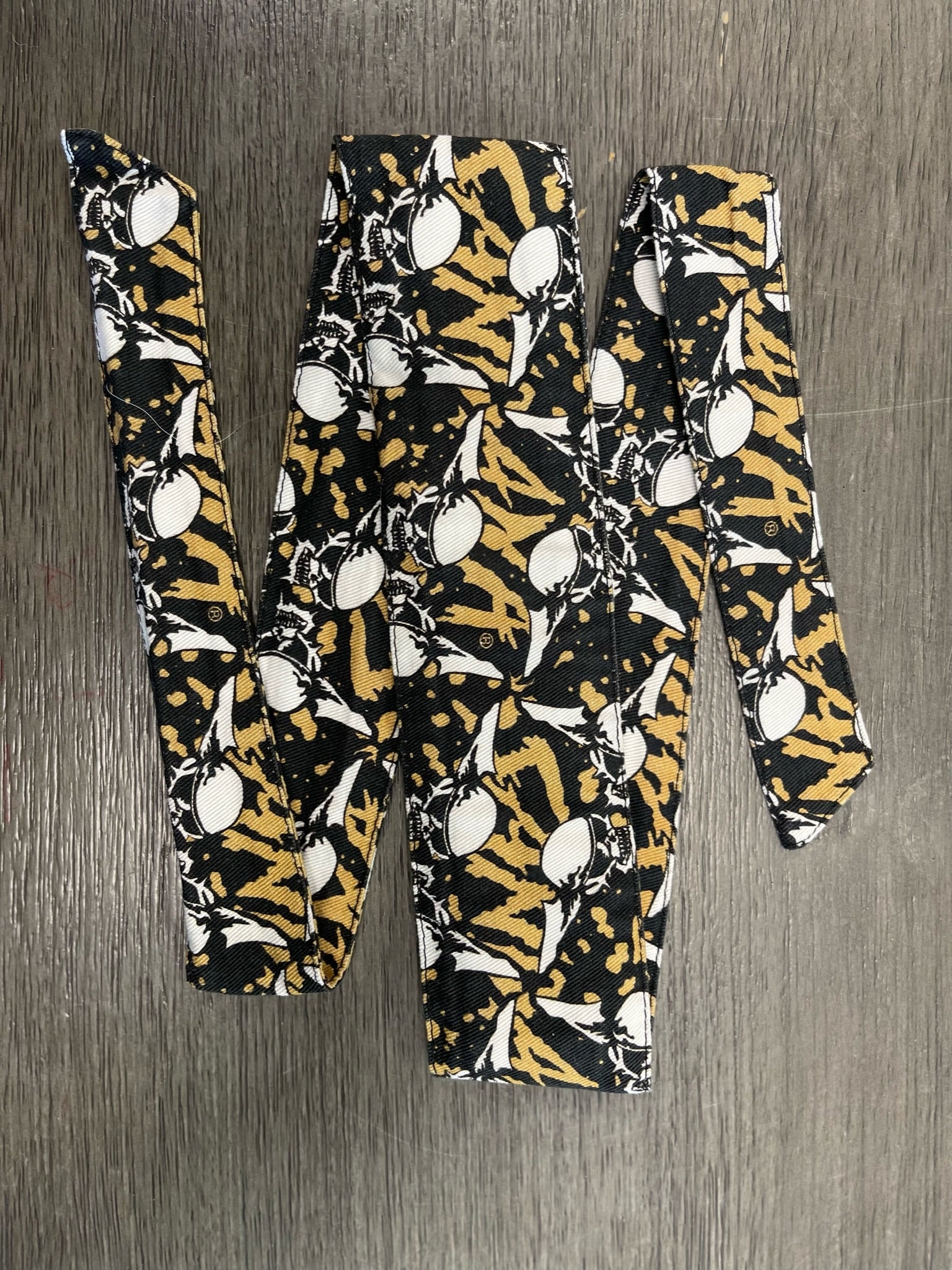 Used Sandana Limited Edition Archie Gold Flying Skulls Paintball Headband - Black/Gold