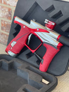 Used Planet Eclipse LV1.6 Paintball Gun - Silver / Red w/ Red and Black Grip Kits and Aluminum FL Tip