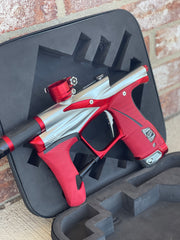 Used Planet Eclipse LV1.6 Paintball Gun - Silver / Red w/ Red and Black Grip Kits and Aluminum FL Tip