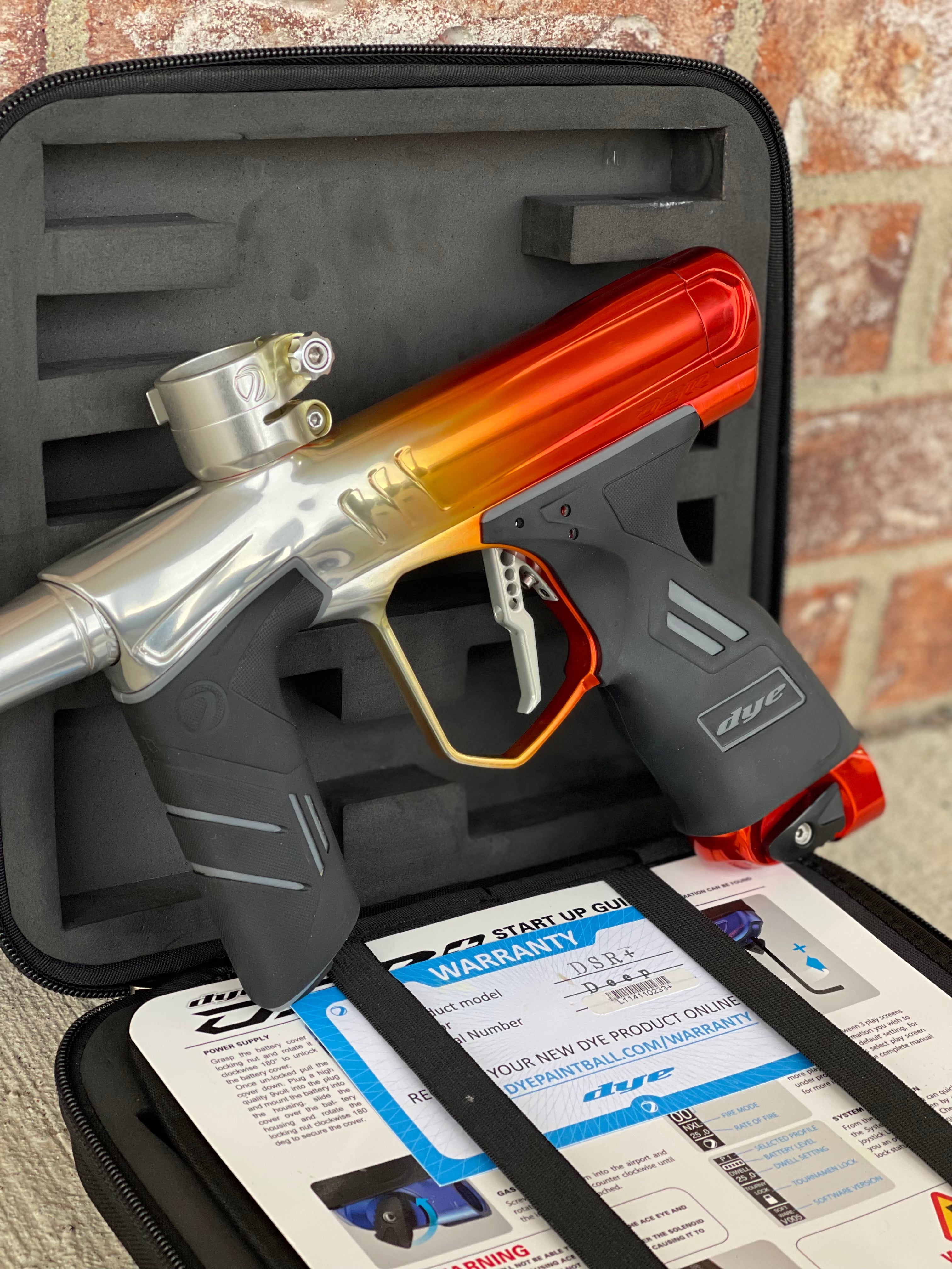 Used Dye DSR+ Paintball Gun - Polished Orange/Silver Fade