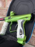 Used Shocker XLS Paintball Marker- Green w/ Extra Inserts and White Grips