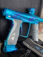 Used Shocker RSX Paintball Marker- Blue Splash