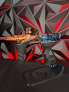 Used Dye DSR Paintball Gun - Blue/Orange Polished Cosmic Fade w/Flex Face Bolt + Can