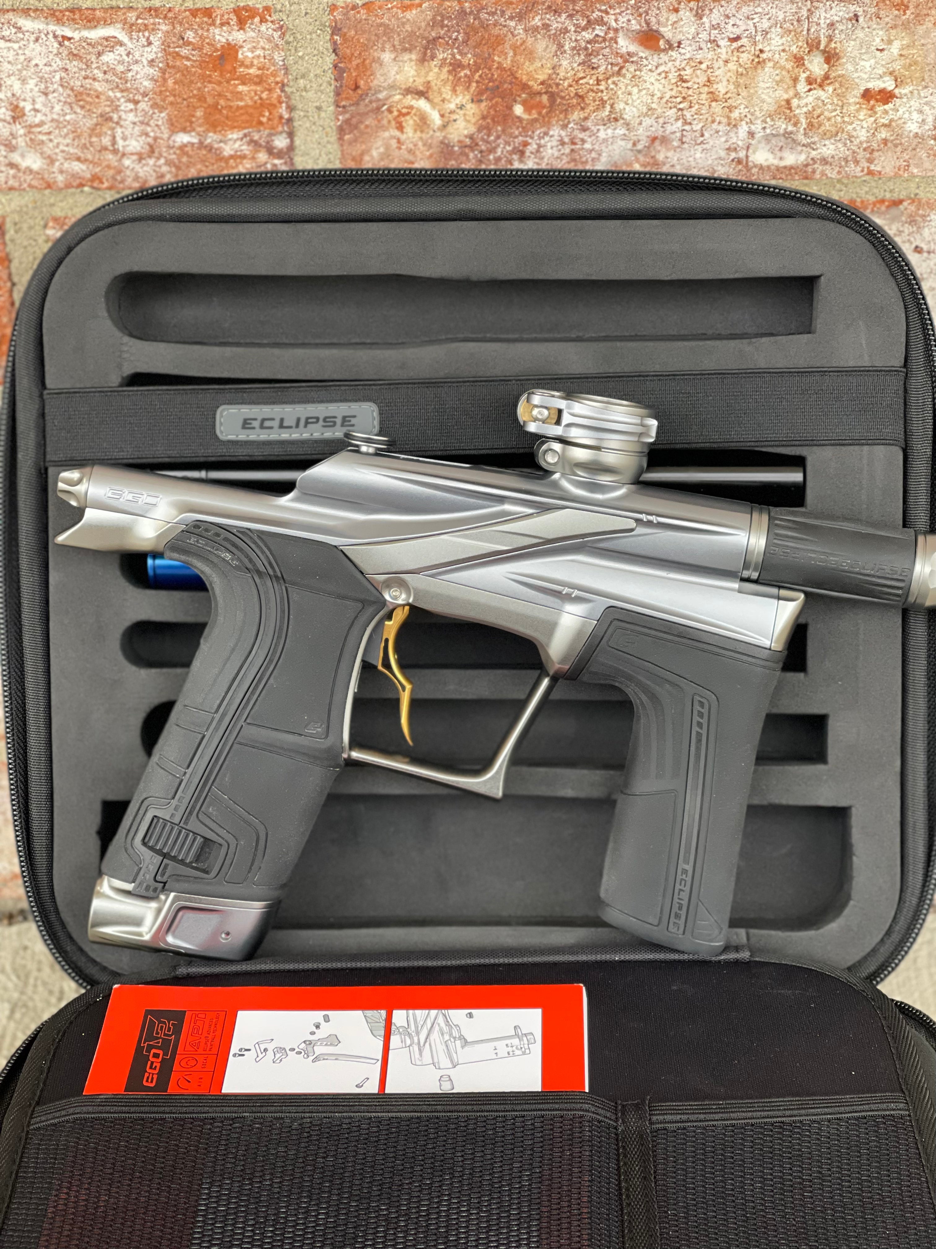 Used Planet Eclipse LV2 Paintball Gun - Gunmetal w/Infamous Deuce Trigger and 3 s63 Inserts