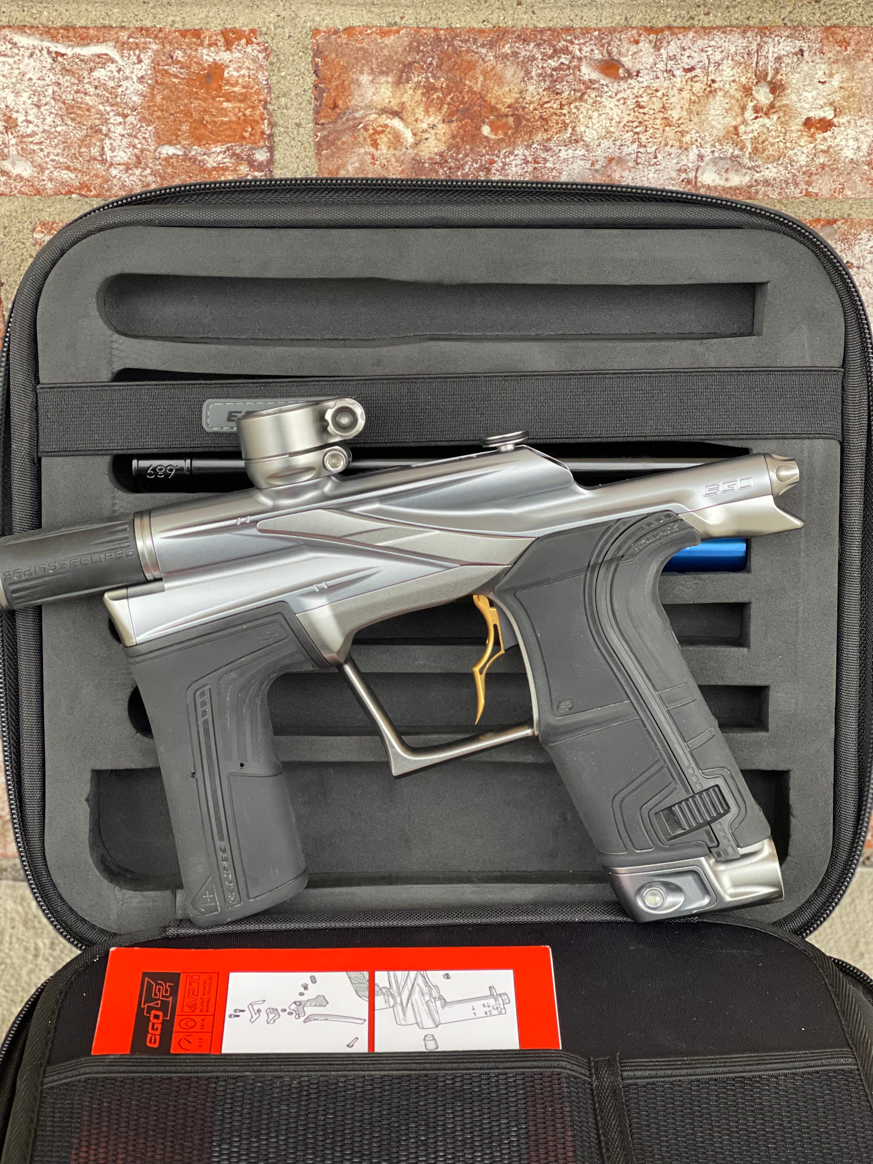 Used Planet Eclipse LV2 Paintball Gun - Gunmetal w/Infamous Deuce Trigger and 3 s63 Inserts