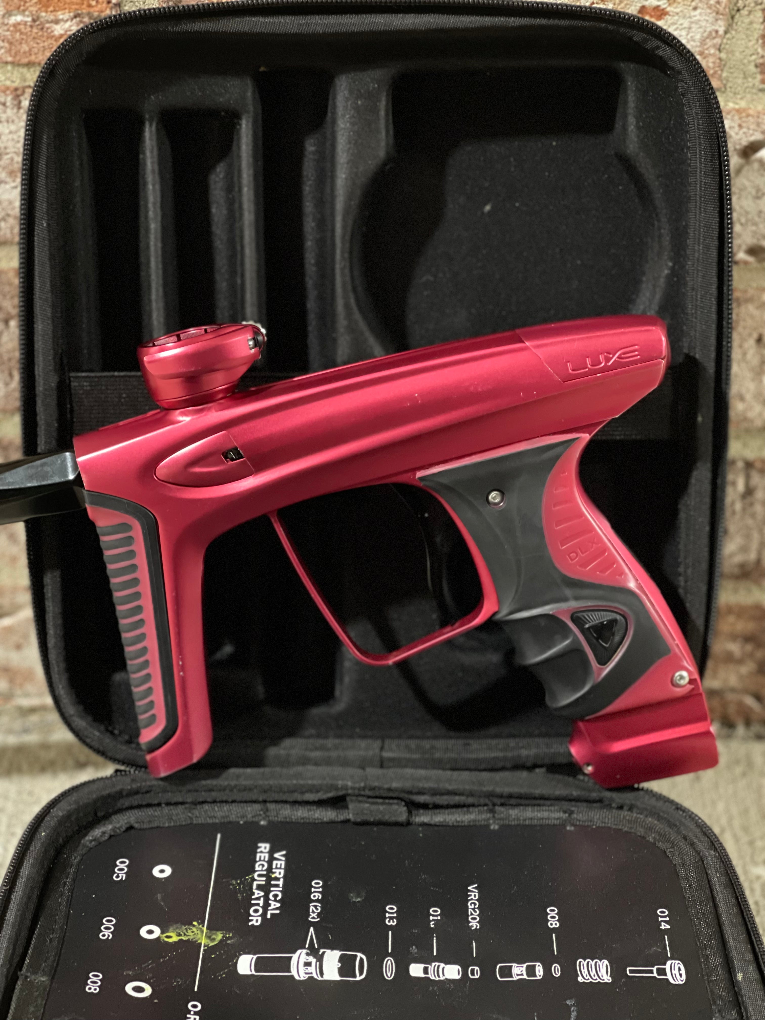 Used DLX Luxe Ice Paintball Gun - Dust Red / Dust Red w/ Inception Barrel, Encore Bolt/Stock Bolt, Scythe Trigger and Stock Trigger, Large Spare Part Kits