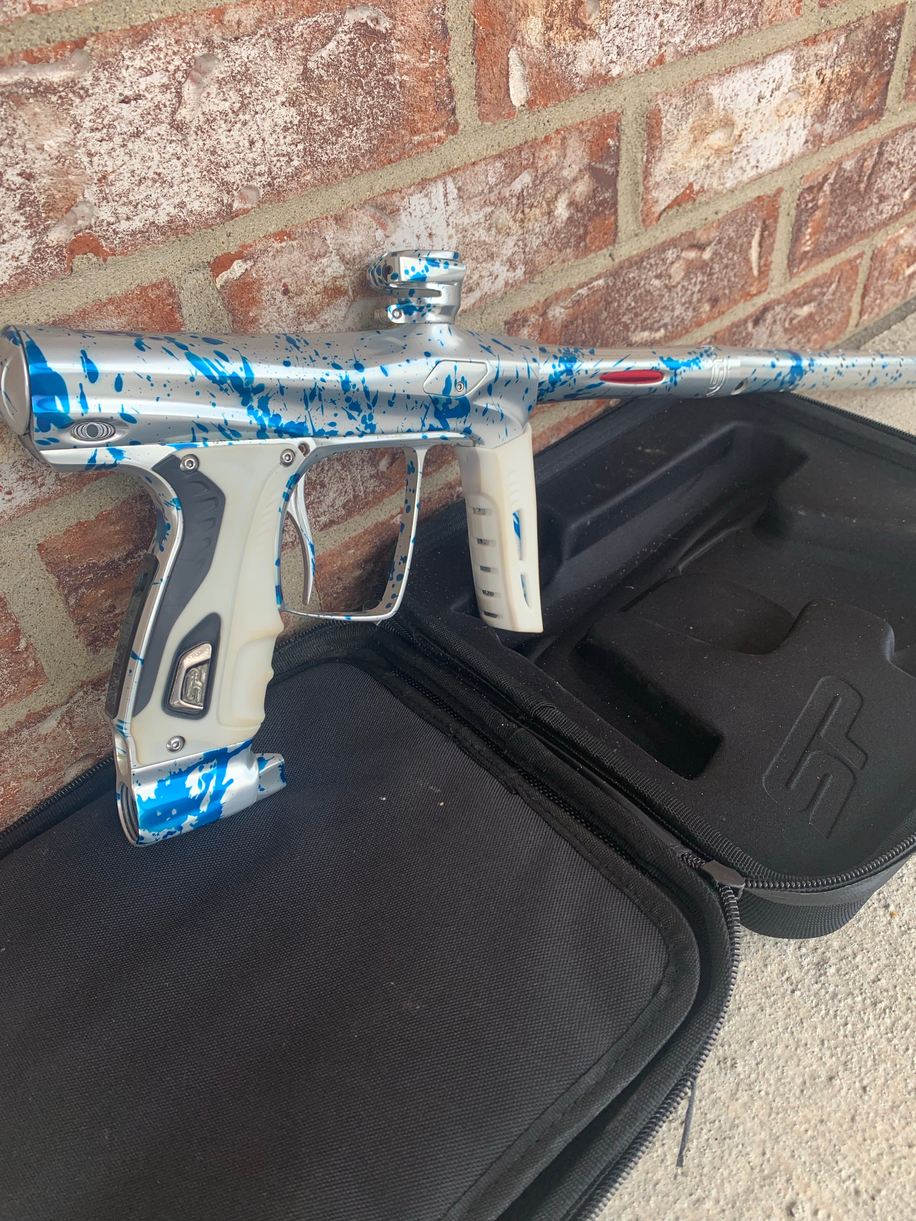 Used Shocker RSX Paintball Marker - Silver/Blue Splash