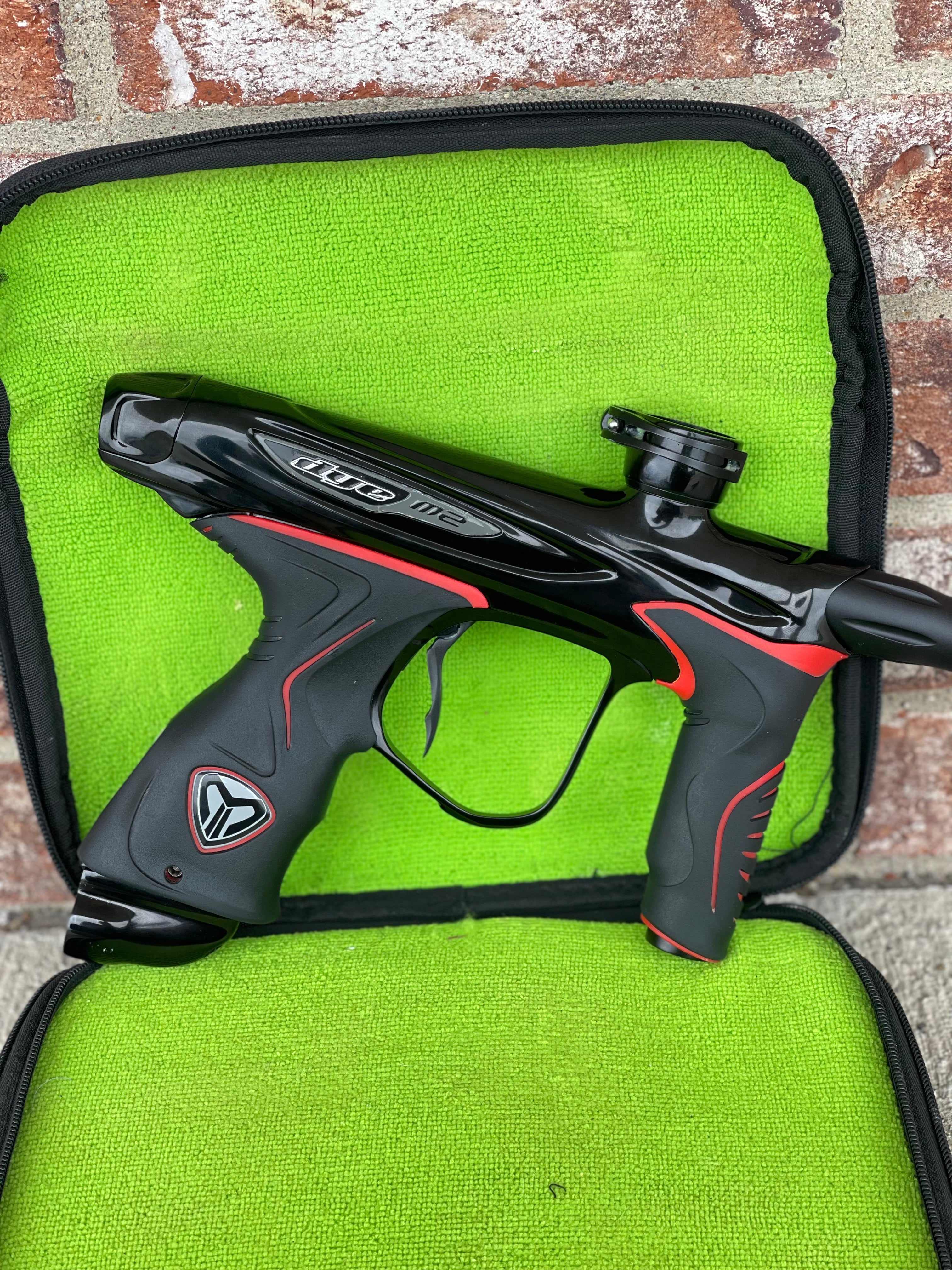 Used Dye M2 MOSAir Paintball Marker - Black w/Red Grip