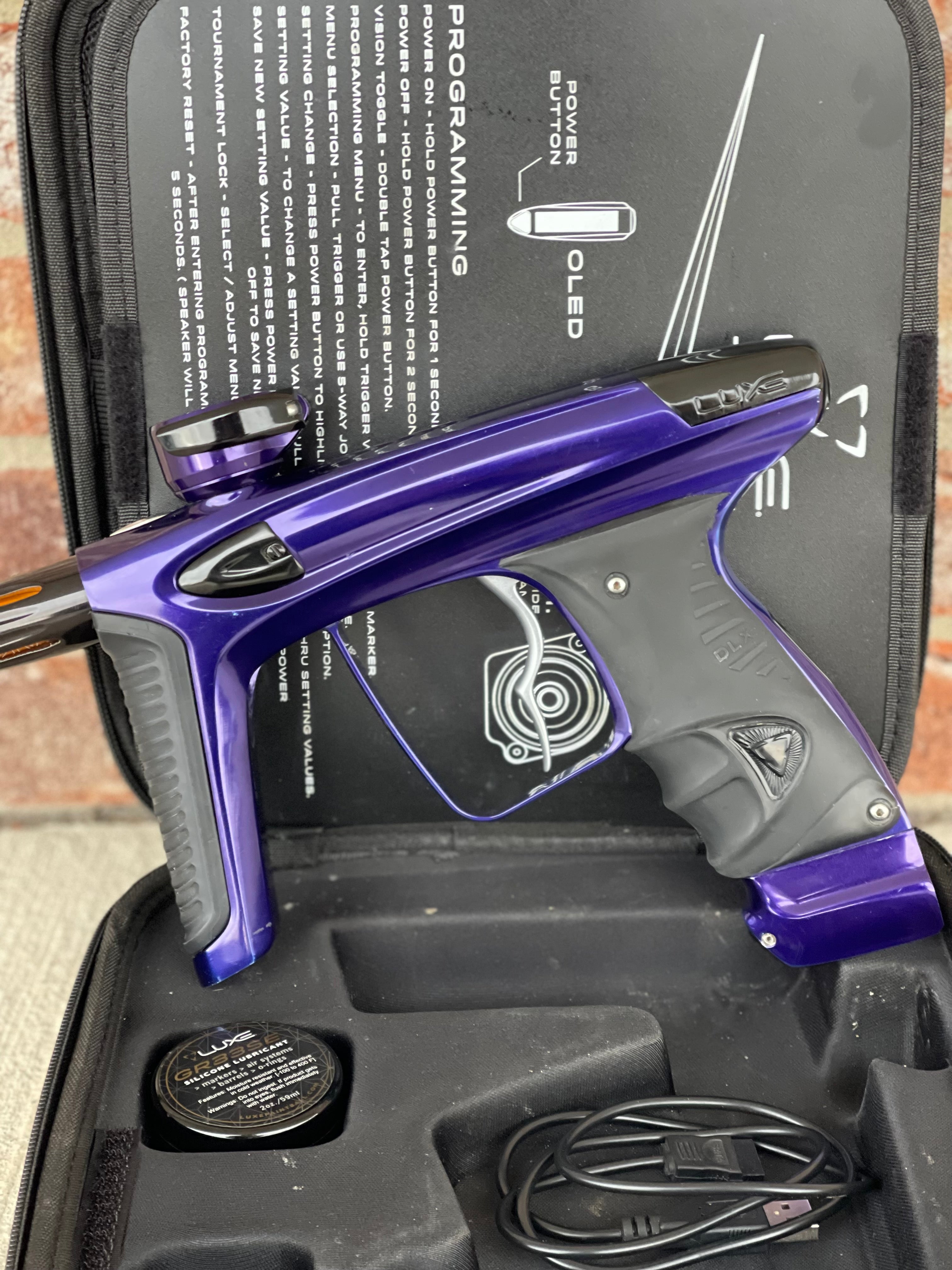 Used DLX Luxe Ice Paintball Gun - Purple / Black