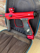 Used Shocker AMP Paintball Gun - Dust Red w/ Infamous Deuce Trigger