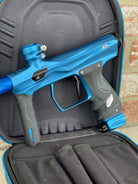 Used Shocker AMP Paintball Gun - Dust Blue w/Deep Blue Freak XL Back