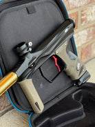 Used Shocker Amp Paintball Gun - Black w/ Red SSC Deuce Trigger and Infamous Red & Gold Silencio FXL Barrel