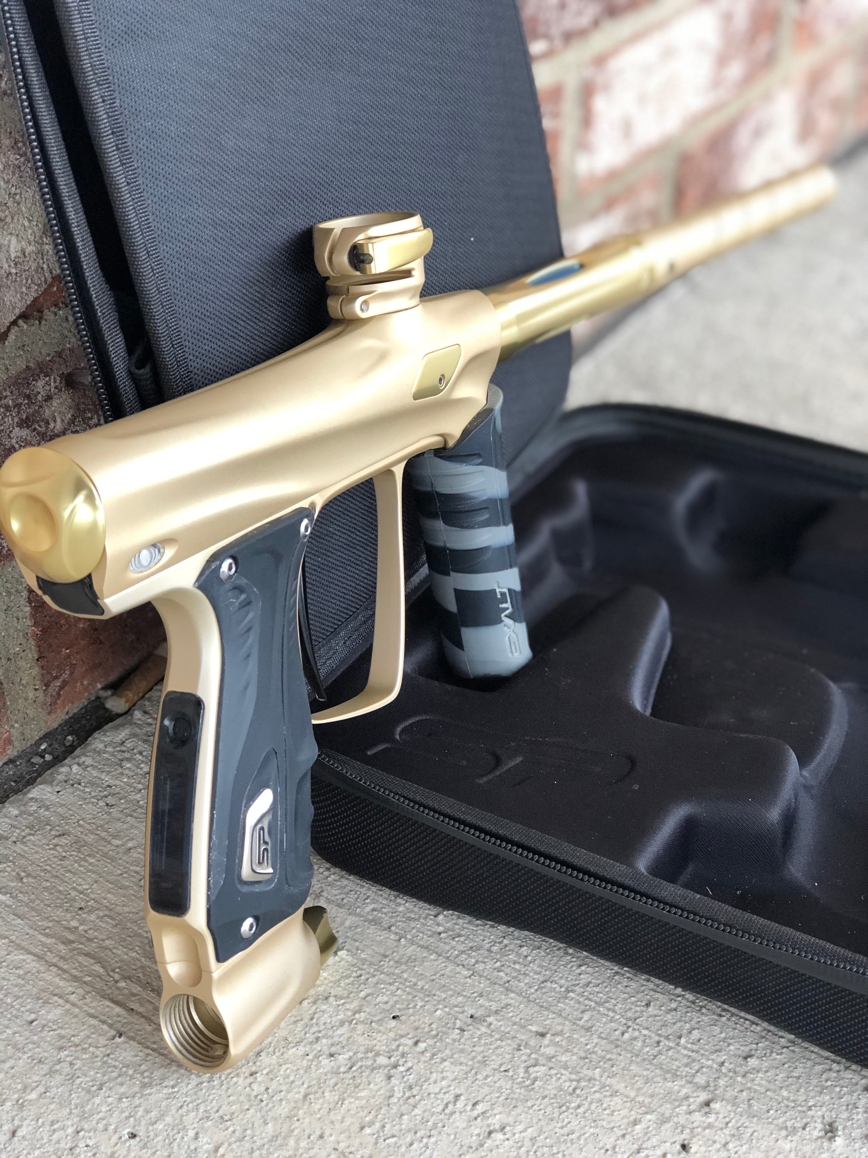 Used Shocker RSX Paintball Gun - Dust Sandstone w/ Gold Accents