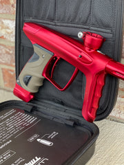 Used DLX Luxe TM40 Paintball Gun - Dust Red / Gloss Red w/ 2 back grips and SSC Soft Tip Bolt
