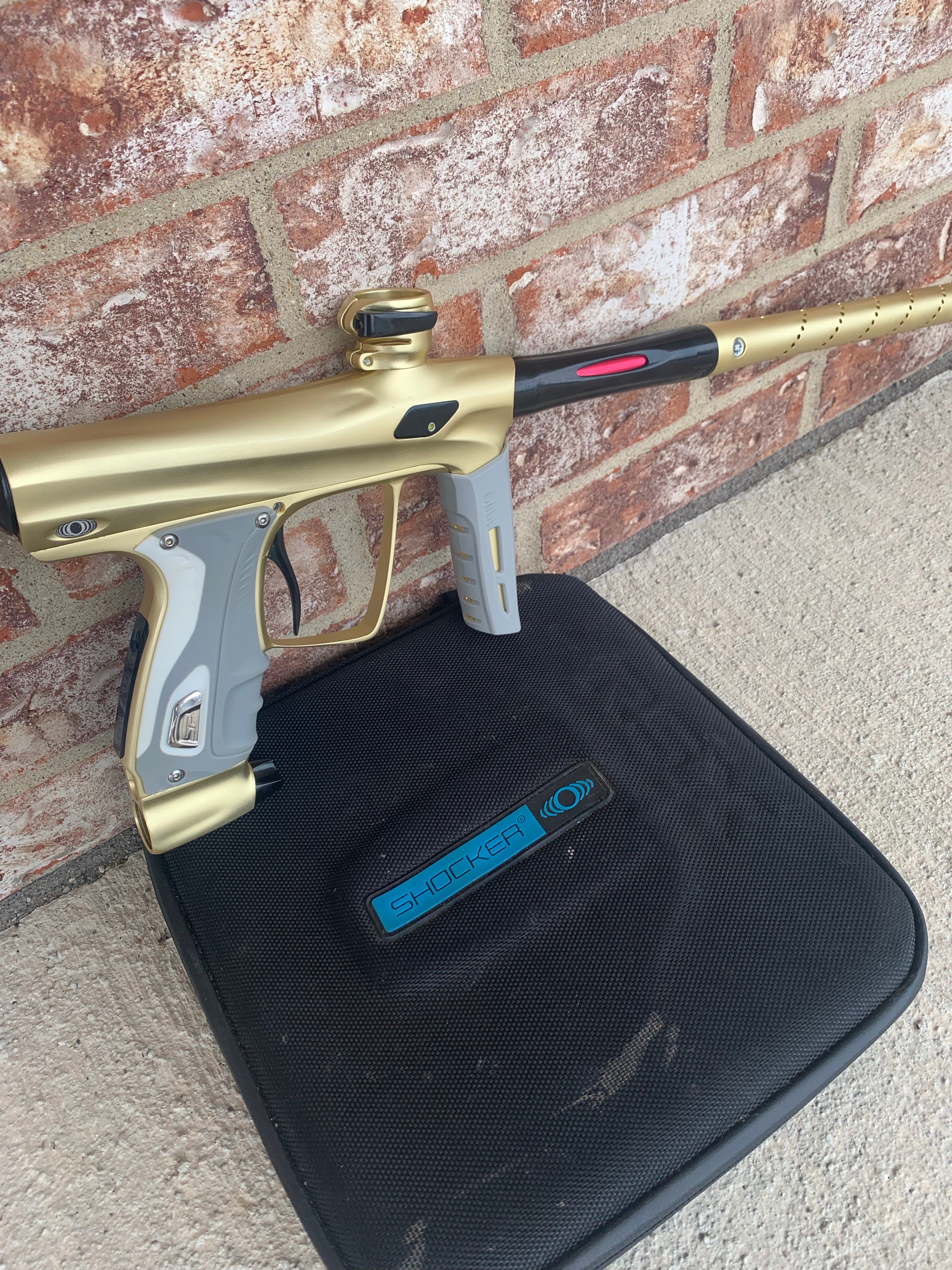 Used Shocker RSX Paintball Marker- Dusk Gold