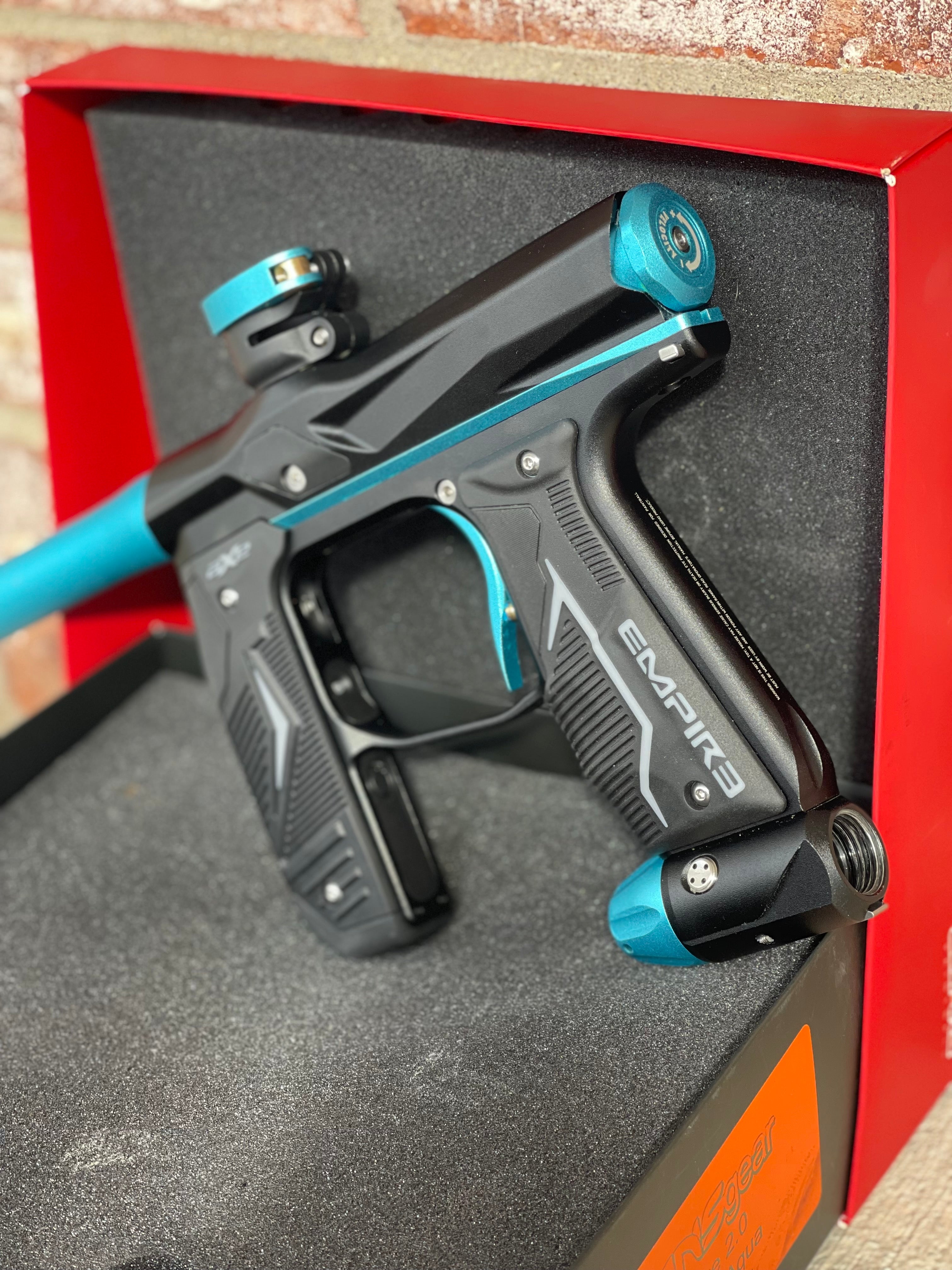 Used Empire Axe 2.0 Paintball Gun - Black w/Teal Accents