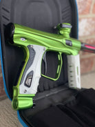 Used Shocker XLS Paintball Marker- Green w/ Extra Inserts and White Grips