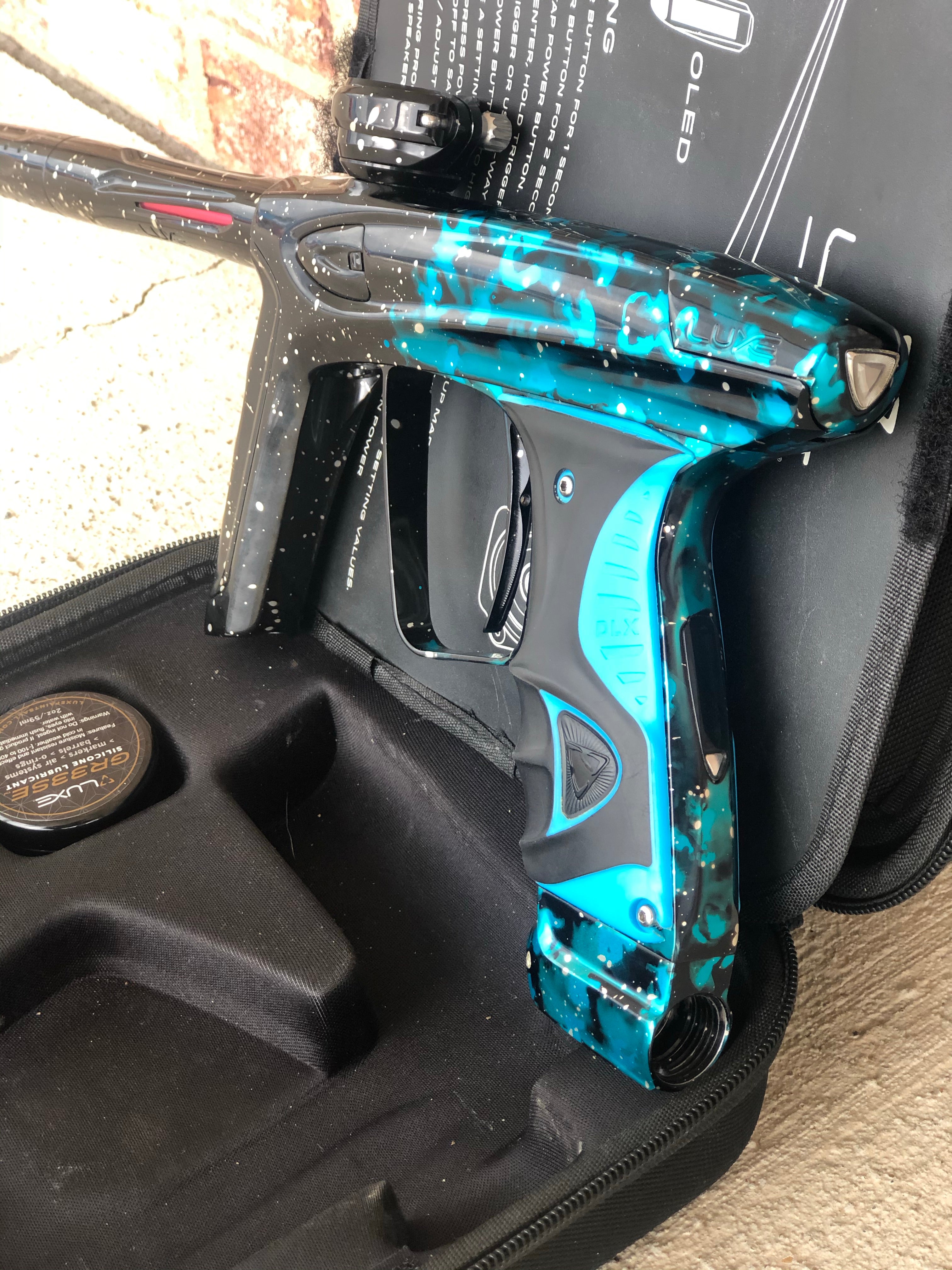 Used DLX Luxe Ice Paintball Gun - Blue Galaxy