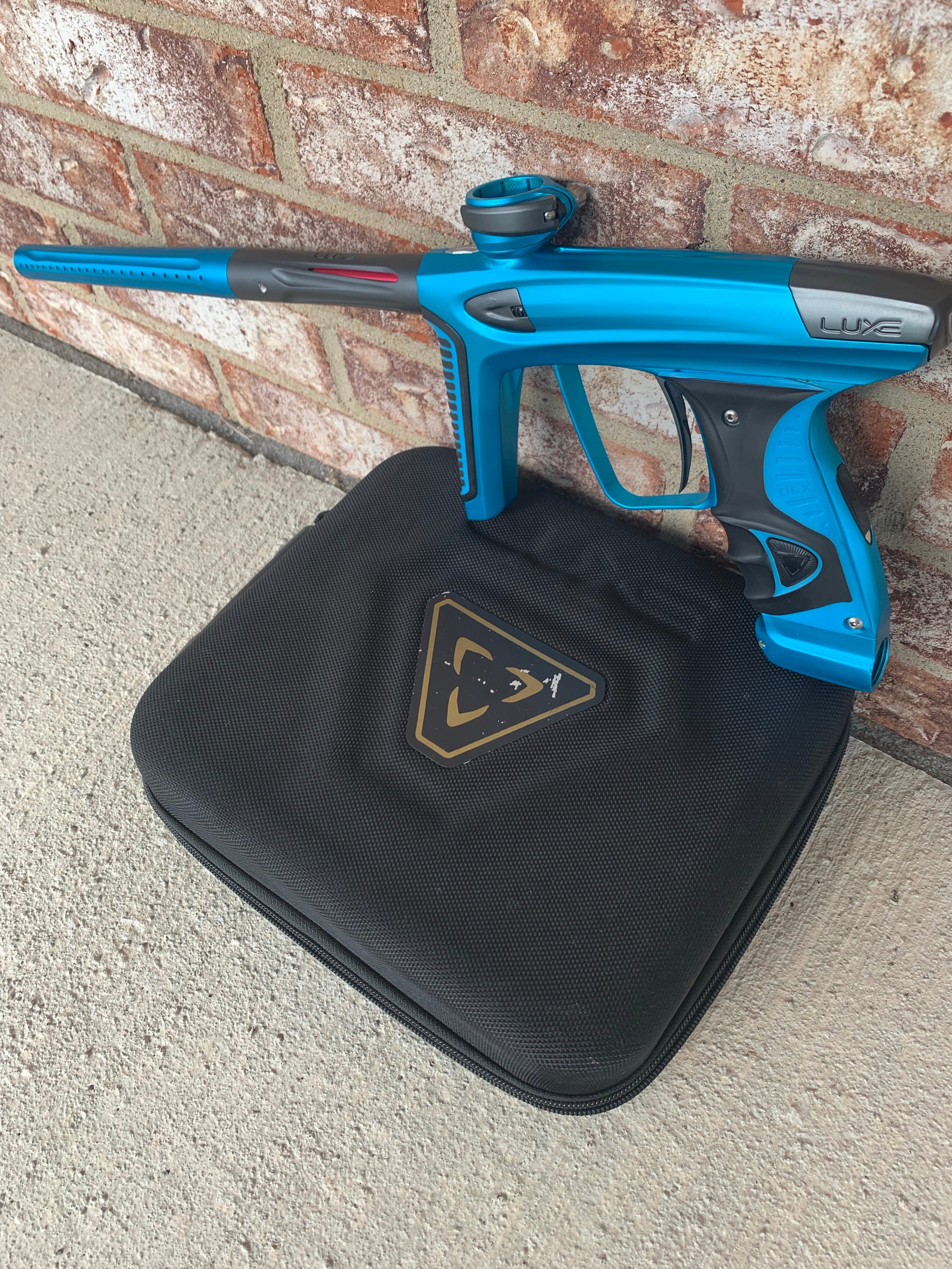 Used Smart Parts DLX Ice Paintball Marker- Teal/Gray