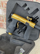 Used Infamous / Planet Eclipse CS2 Paintball Gun - Gold / Black w/ Deuce Trigger & 2 FL Inserts