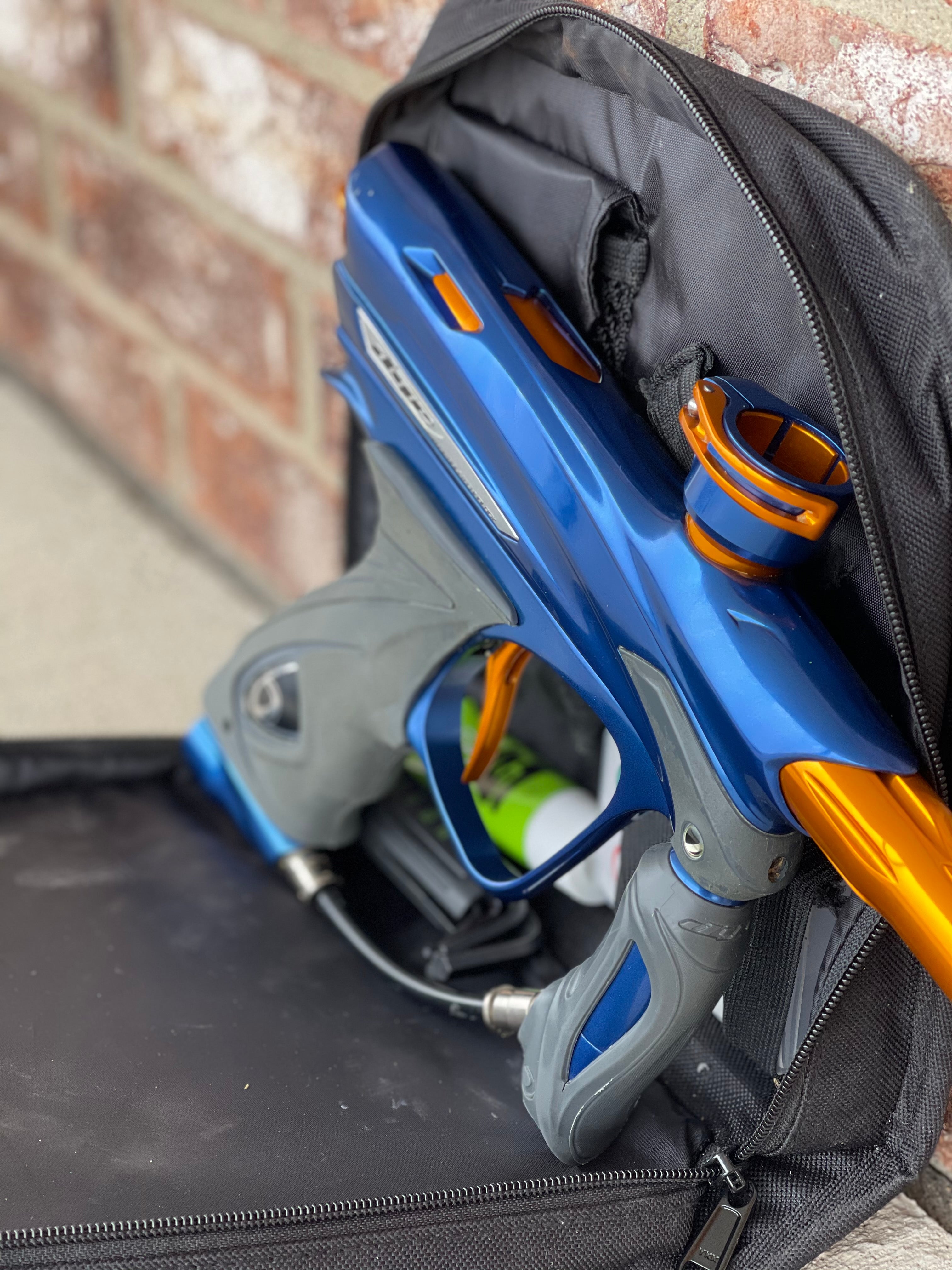 Used Dye DM13 Paintball Marker - Blue / Orange