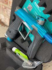 Used Planet Eclipse Geo 4 Paintball Gun - Teal/Grey w/ SSC Trigger with Dye UL Barrel System