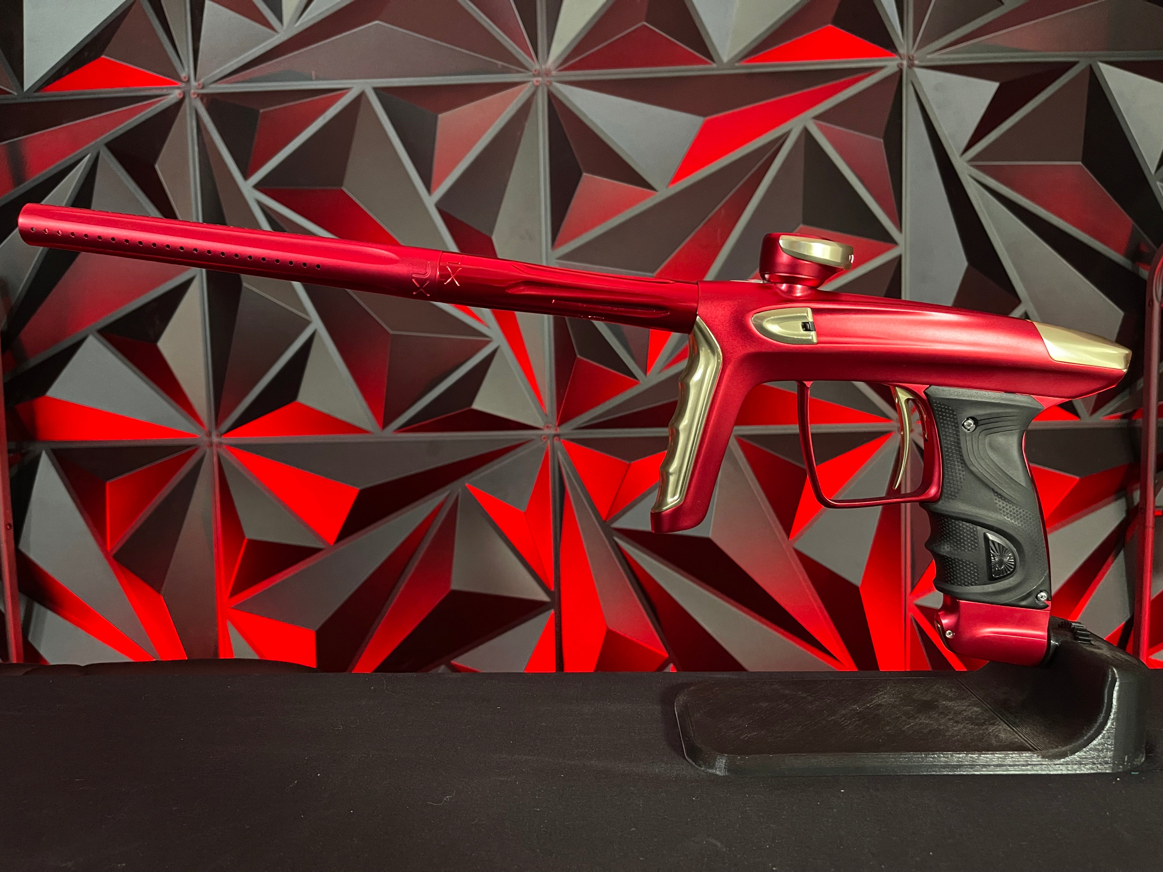 Used DLX Luxe TM40 Paintball Gun - Dust Red / Gloss Gold