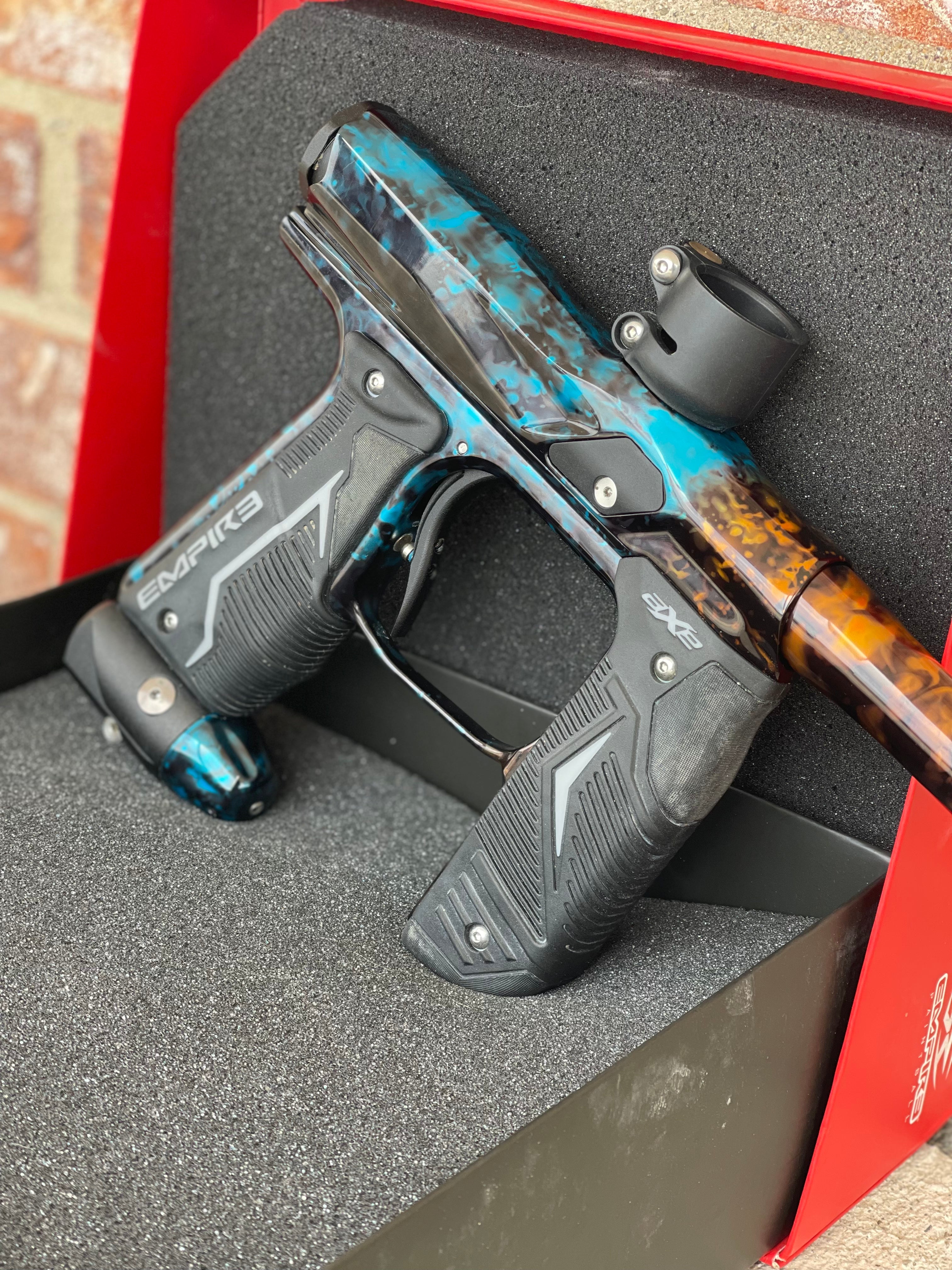 Used Empire Axe 2.0 Paintball Gun - Acid Wash Custom Anno (Orange Teal)