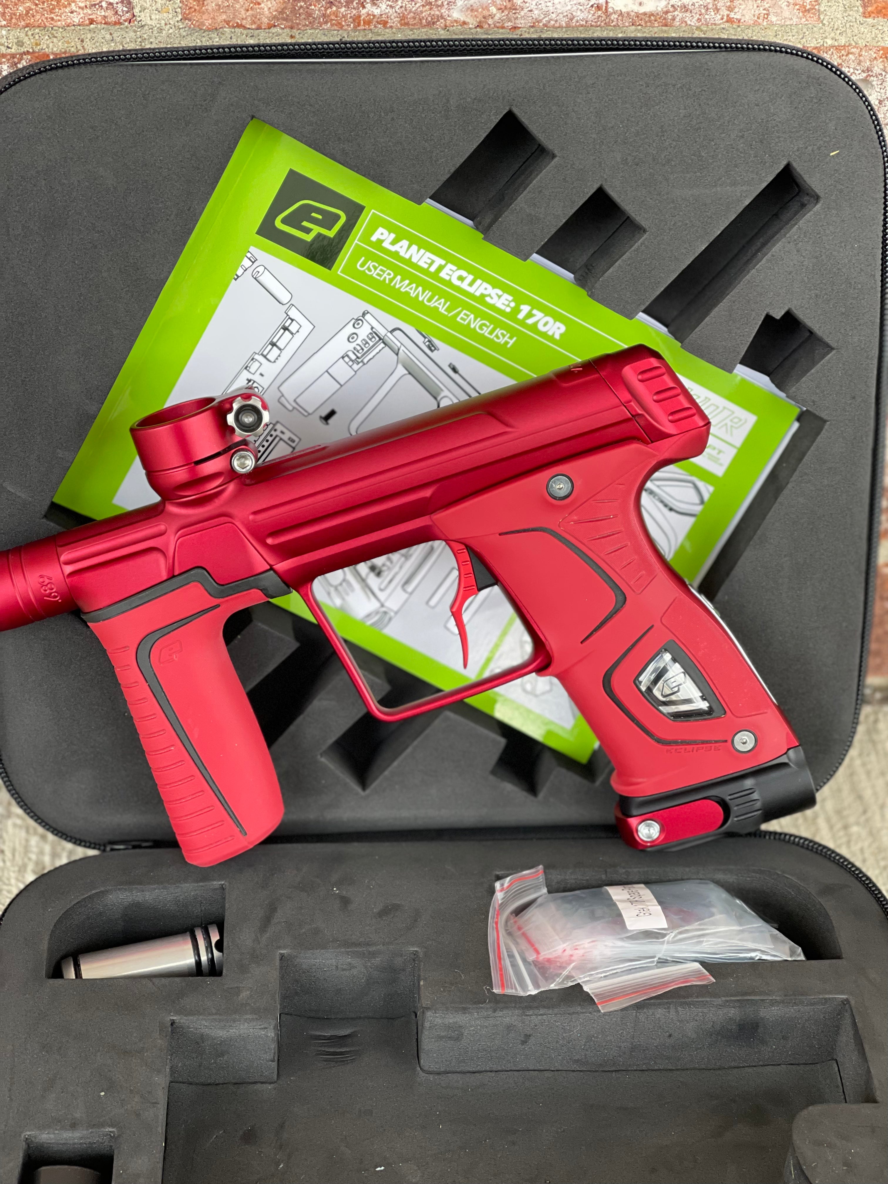 Used Planet Eclipse 170R Paintball Gun - Dust Red w/Red Grip Kit, Deuce Trigger, and ST3 Bolt