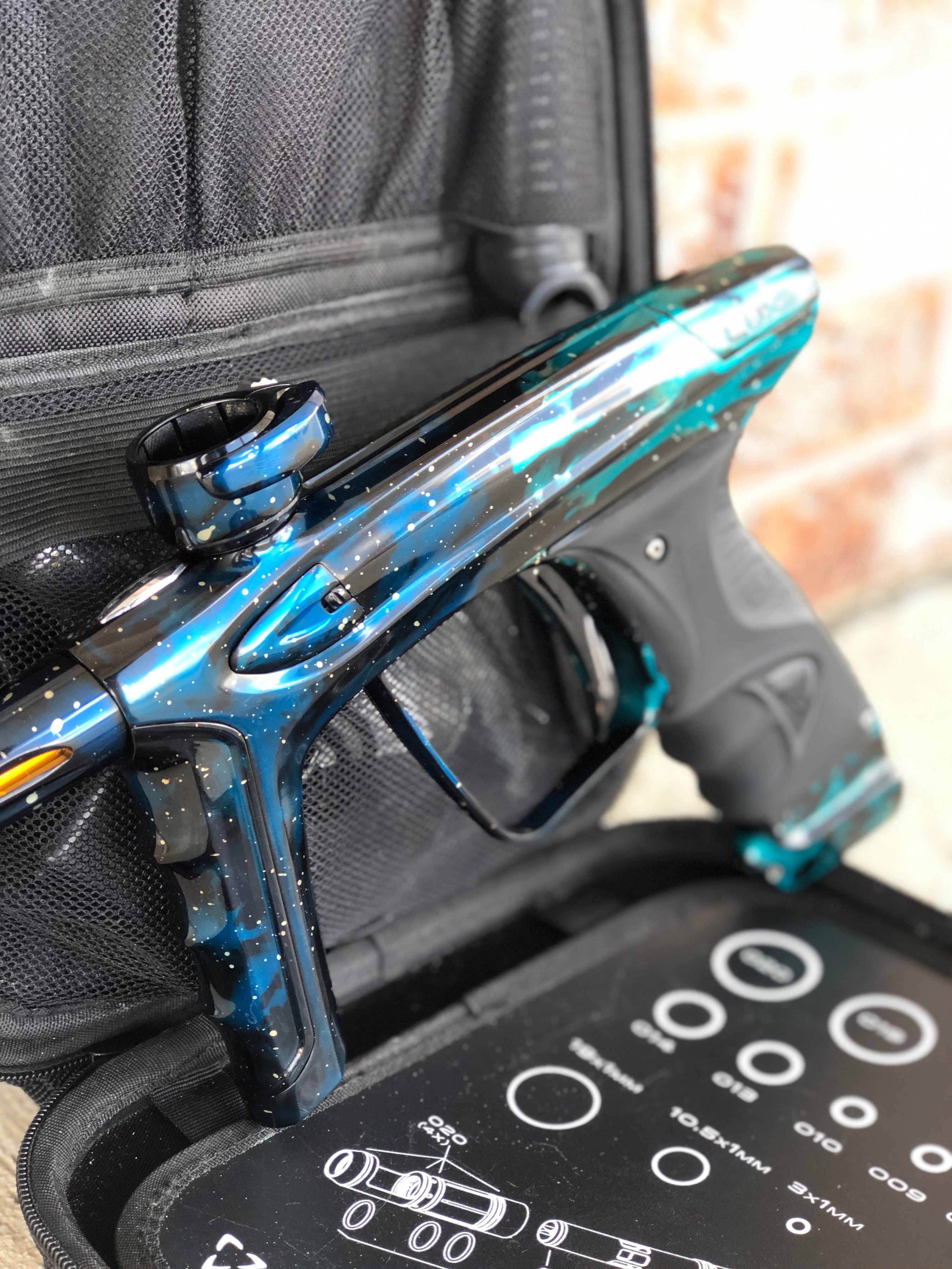 Used DLX Luxe Ice Paintball Gun - Galaxy Teal/Black/Blue