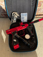 Used Shocker AMP Paintball Gun - Dust Red w/ Infamous Deuce Trigger