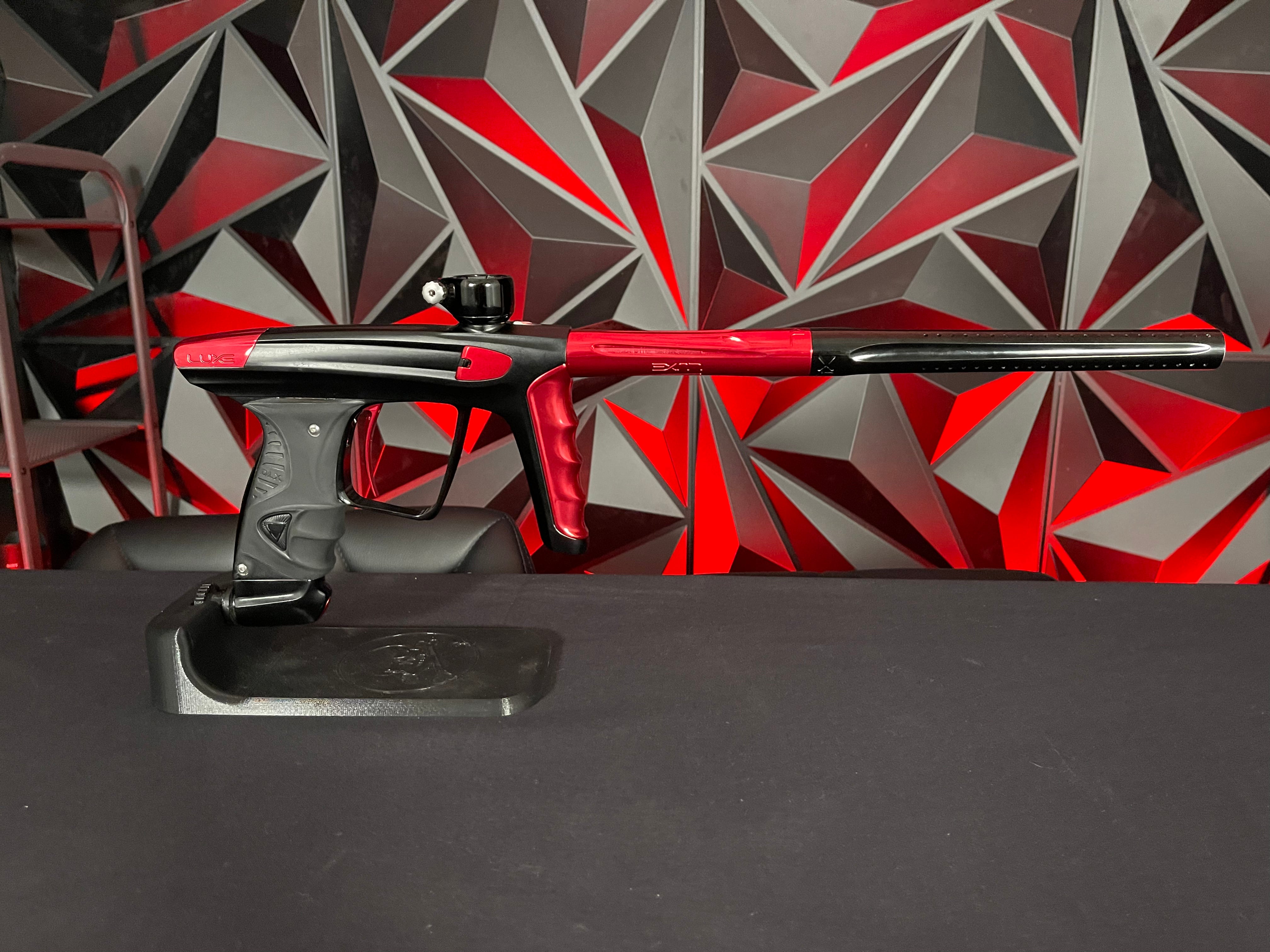 Used DLX Luxe X Paintball Gun - Dust Black Body/Gloss Trigger Frame/Red Accents