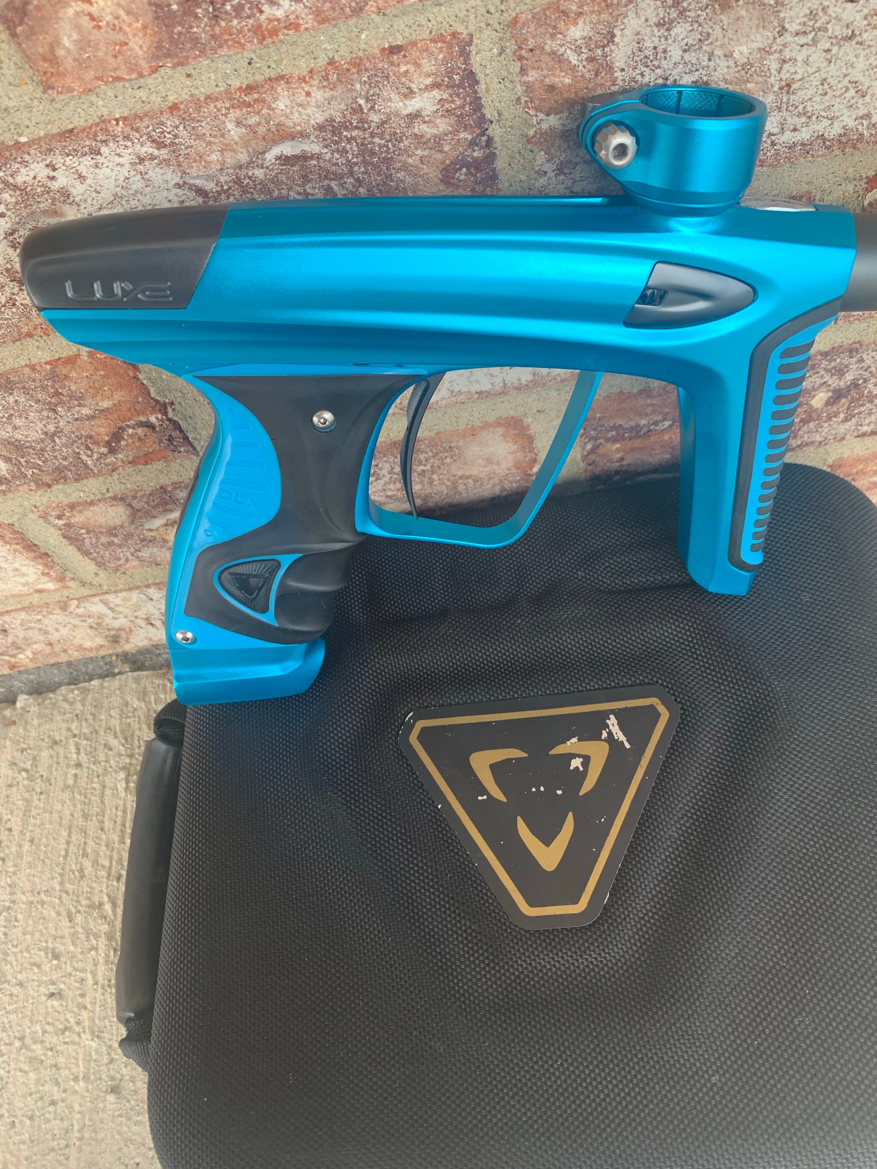 Used Smart Parts DLX Ice Paintball Marker- Teal/Gray