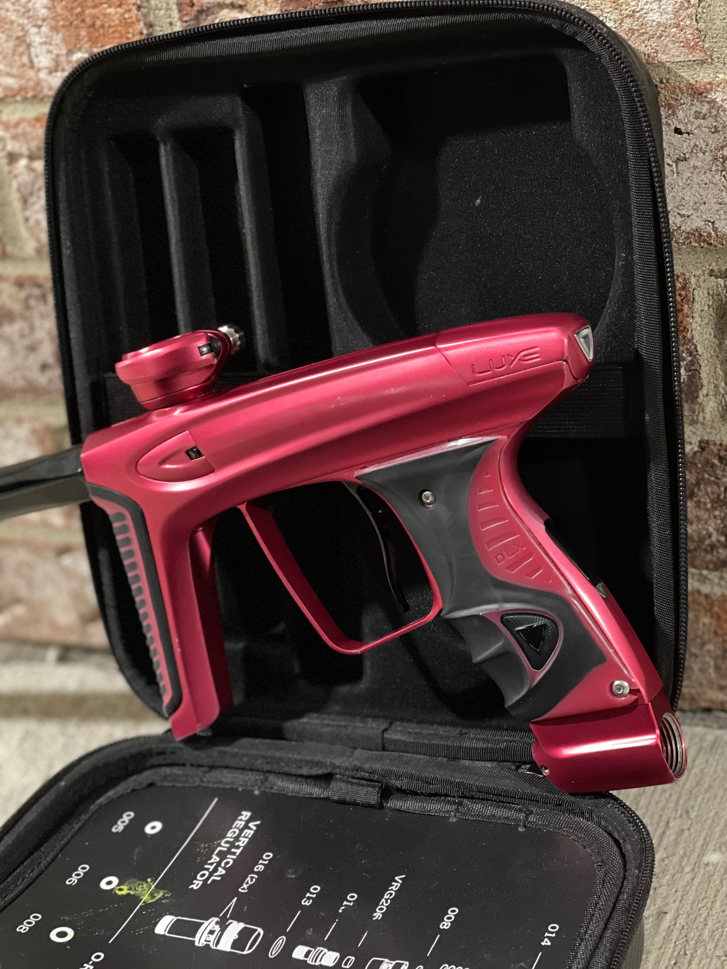 Used DLX Luxe Ice Paintball Gun - Dust Red / Dust Red w/ Inception Barrel, Encore Bolt/Stock Bolt, Scythe Trigger and Stock Trigger, Large Spare Part Kits