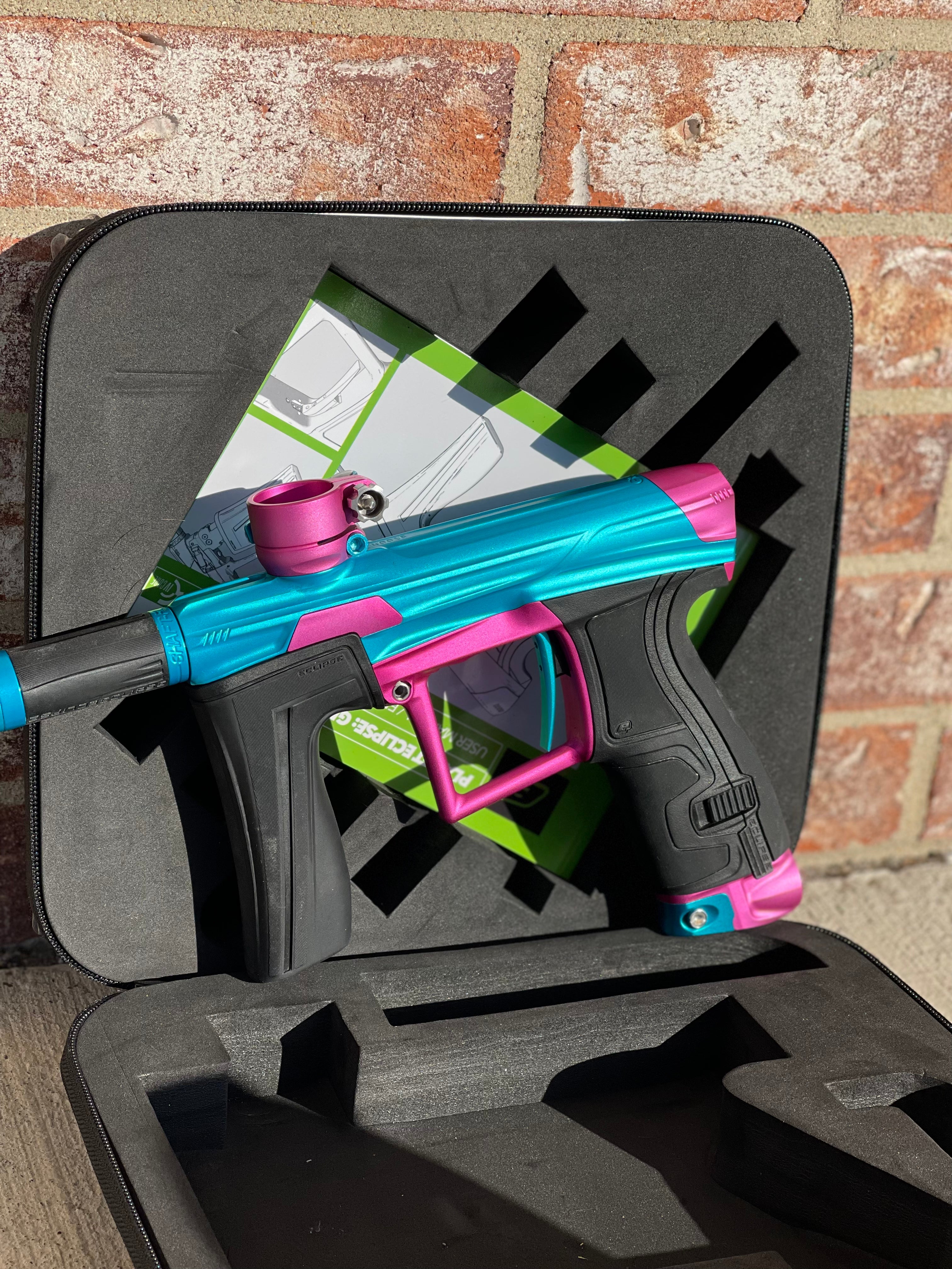 Used Planet Eclipse Geo 4 Paintball Gun - Teal/Pink