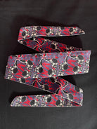 Used Sandana Flying Skulls Headband - Purple/Pink w/ Olive Tag