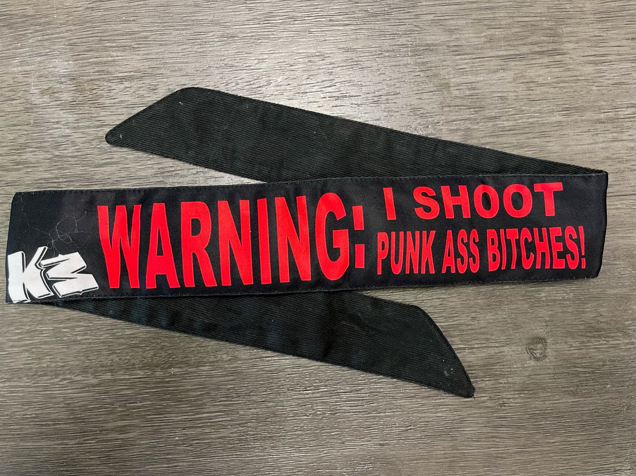 Used KM Headband - Black / Red "Warning: I Shoot..."