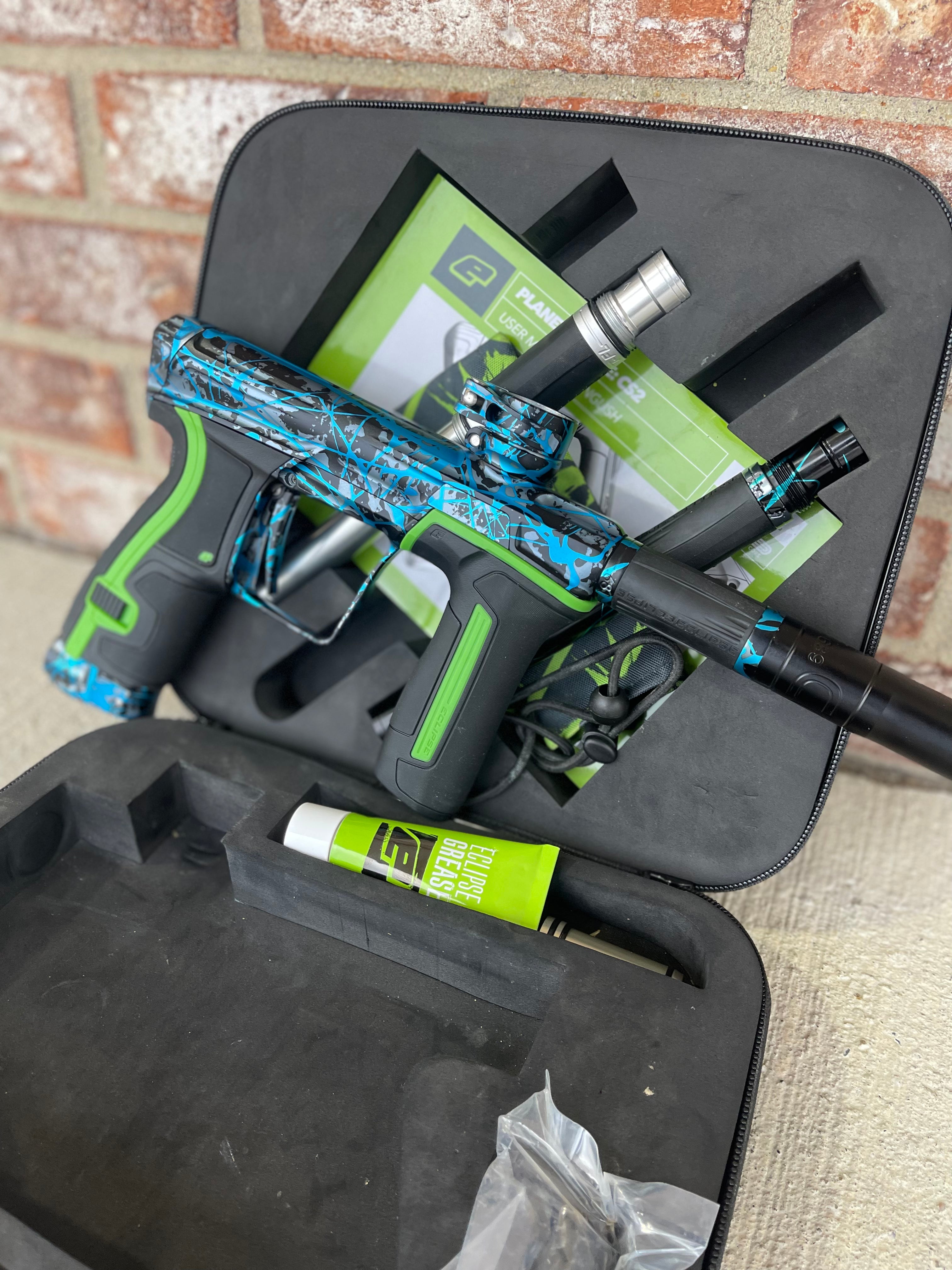 Used Planet Eclipse CS2 Paintball Gun - Aftershock Splash w/ Green Grip Kit